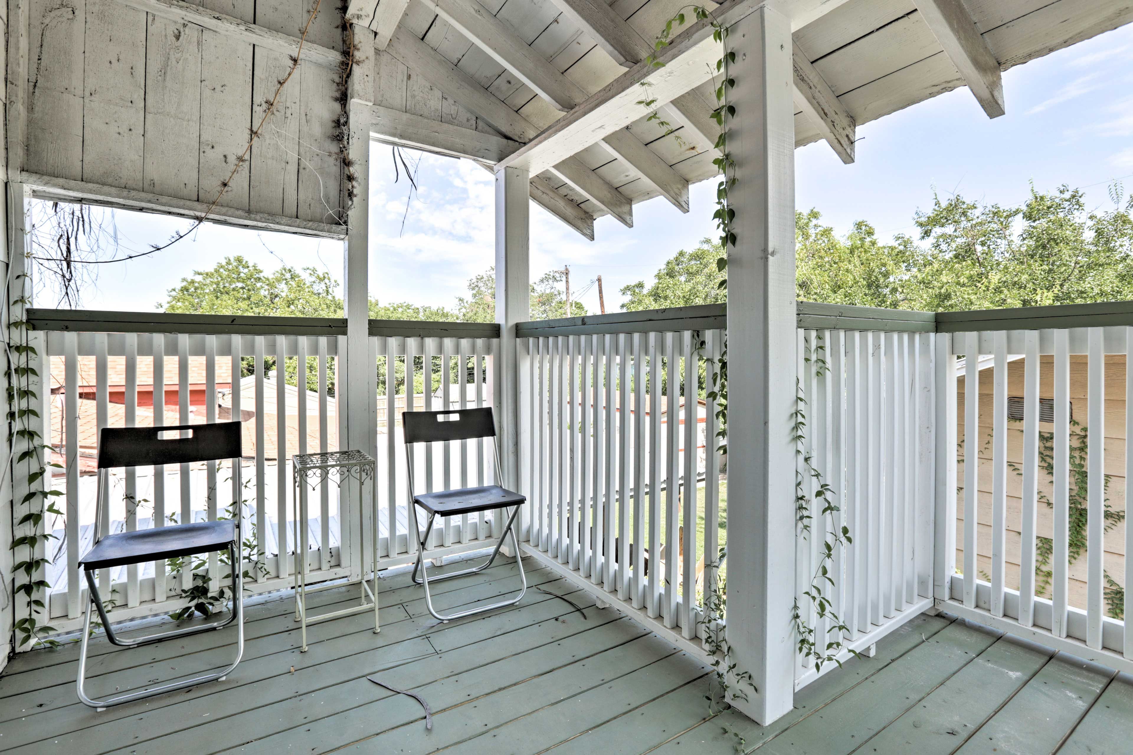 Relax with a glass of wine or cup of coffee on this beautiful balcony.