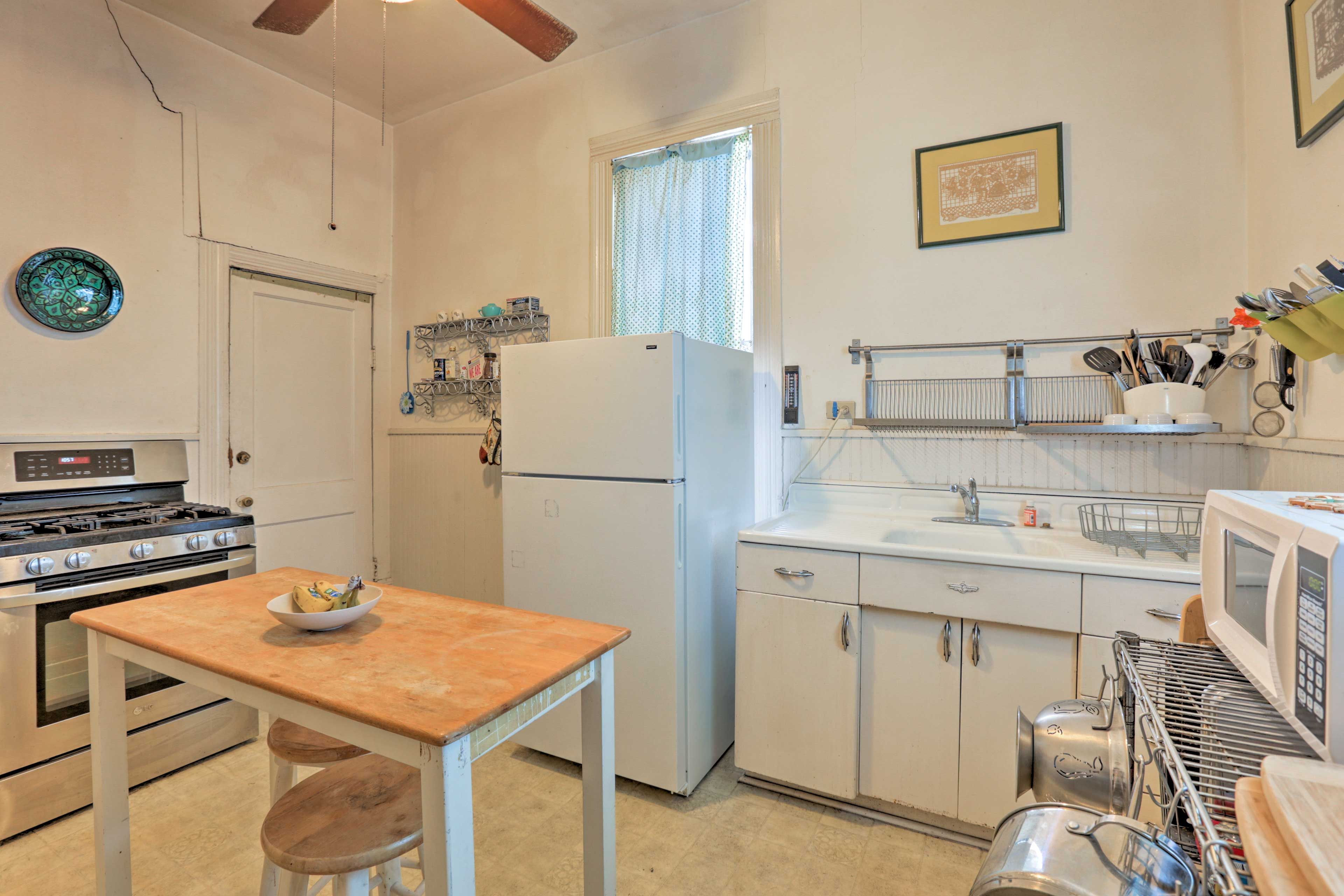 Use the quaint wooden island for meal preparations or munching on a snack.