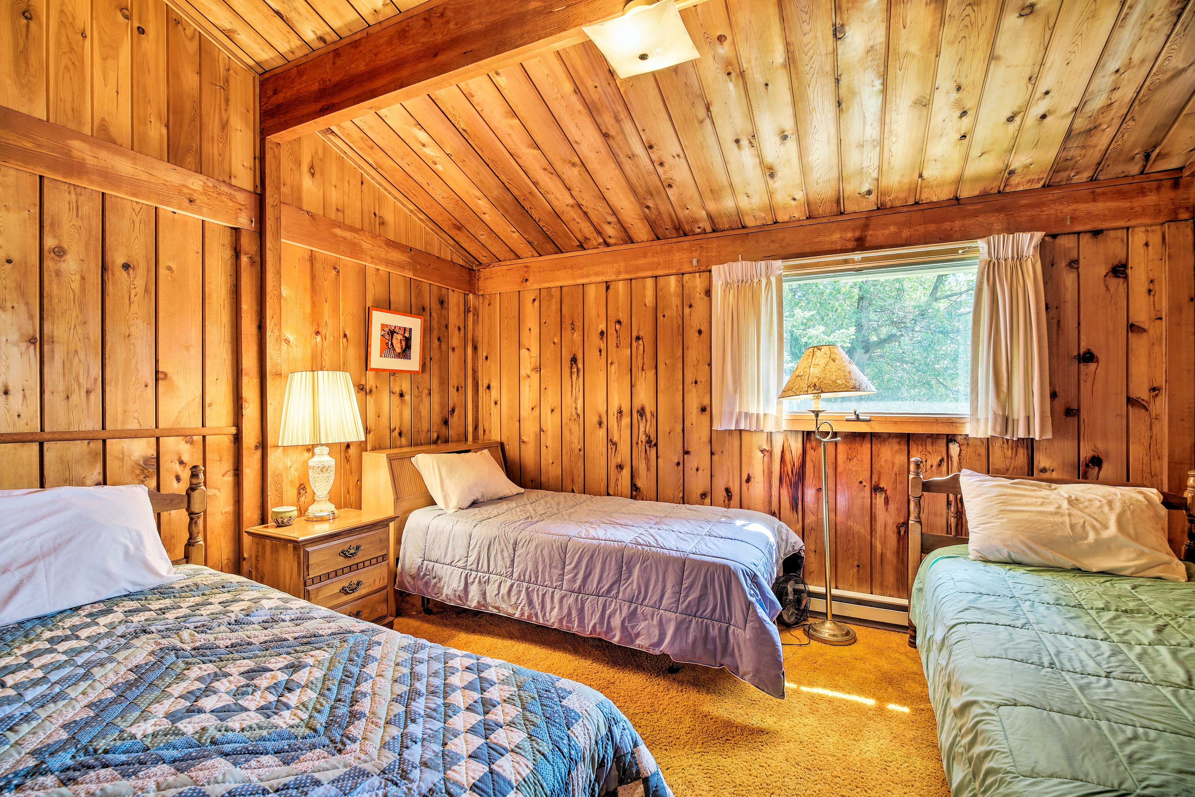 The kids will love this room, complete with 3 twin beds.