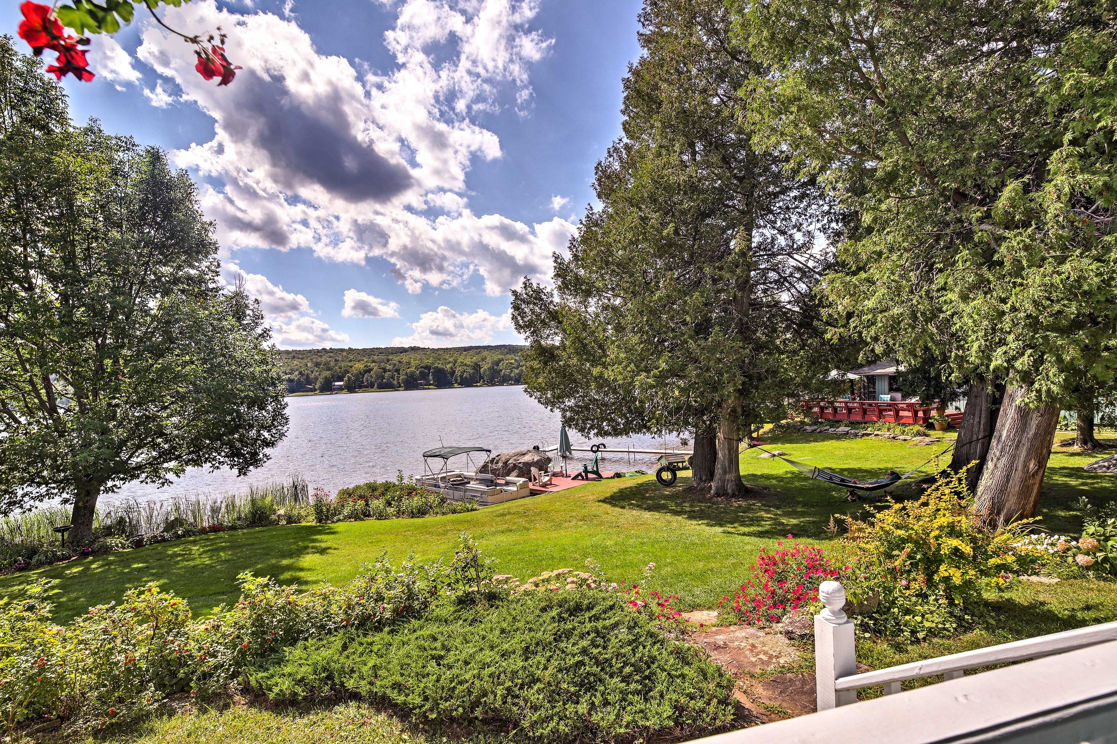 Enjoy waterfront views and relax in the hammock.