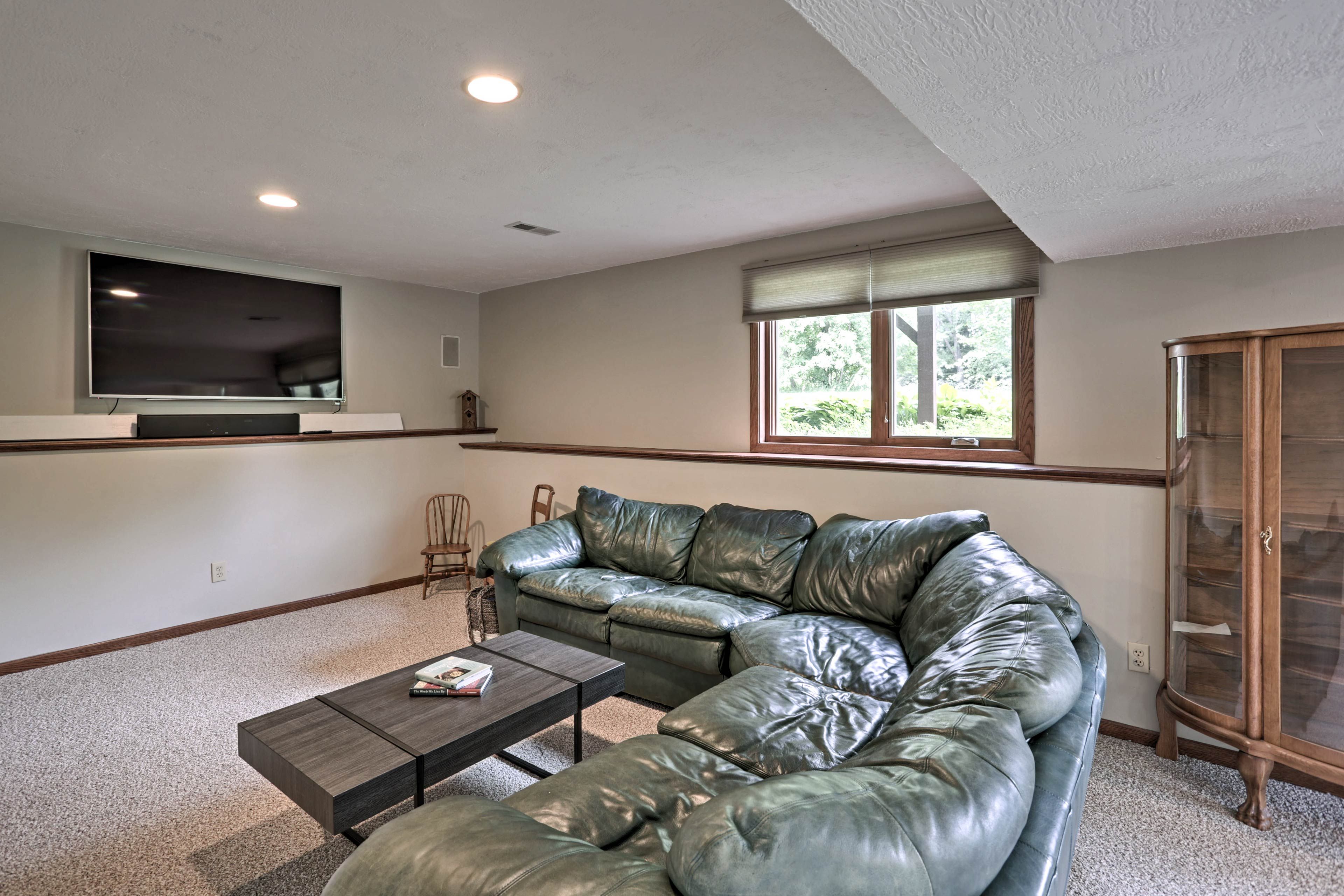 Make some popcorn and watch a movie on the flat-screen TV.