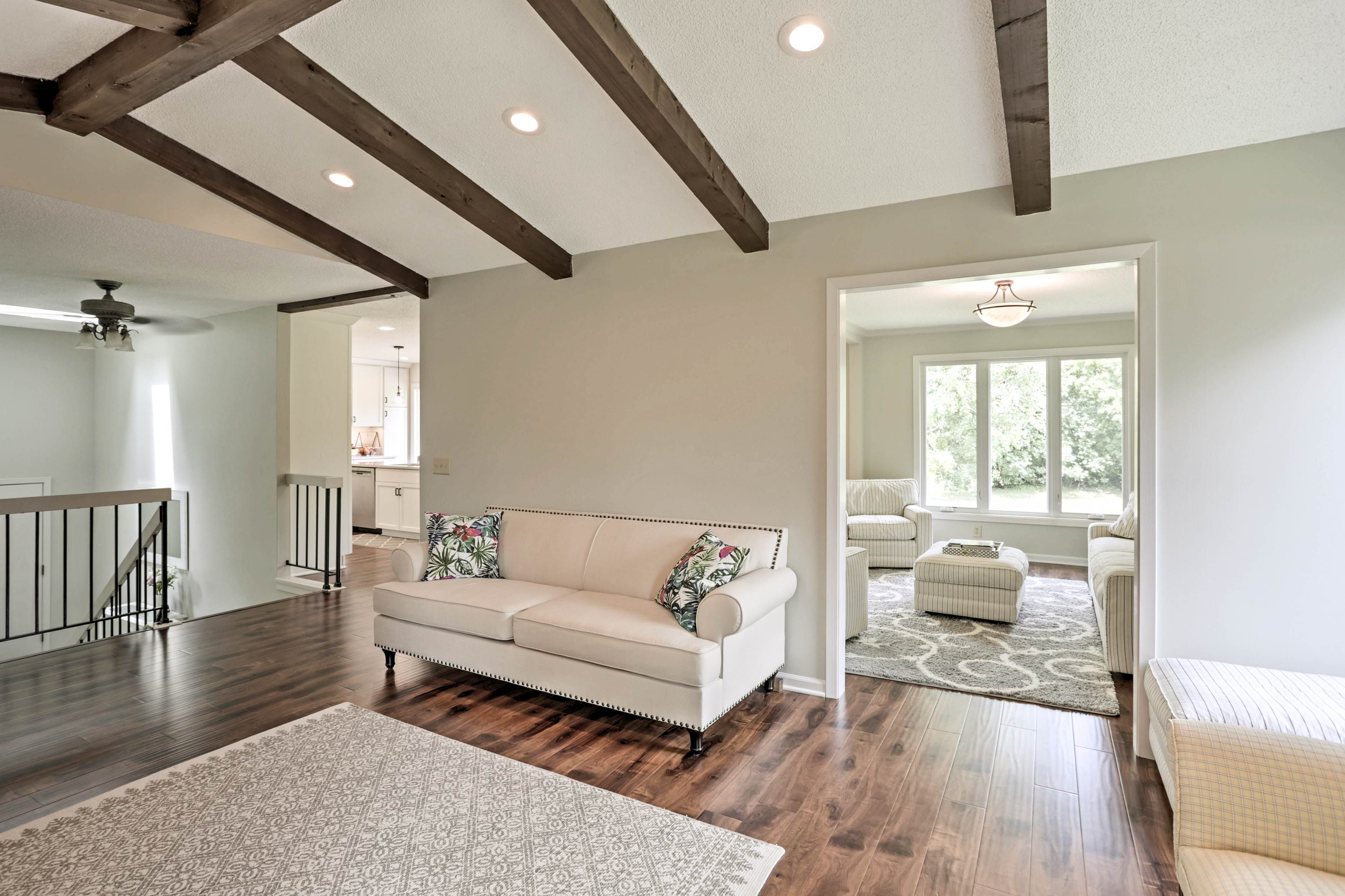 Get cozy on the plush furnishings as you settle in.