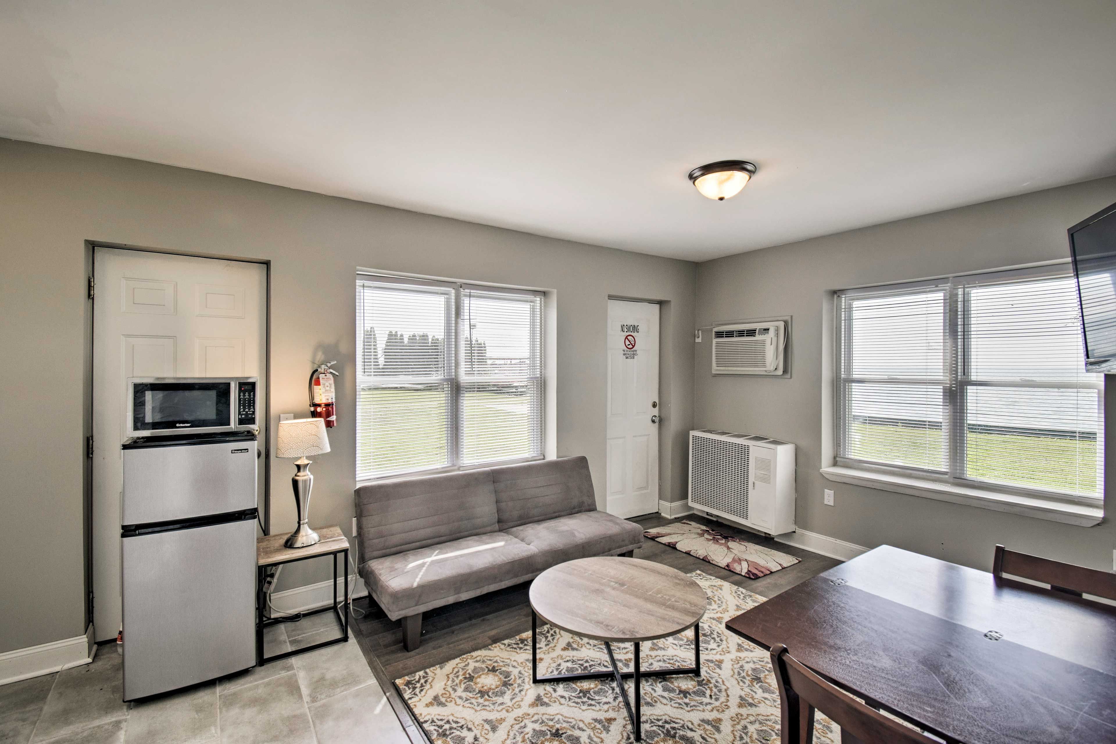 Curl up on the couch and watch the flat-screen TV.