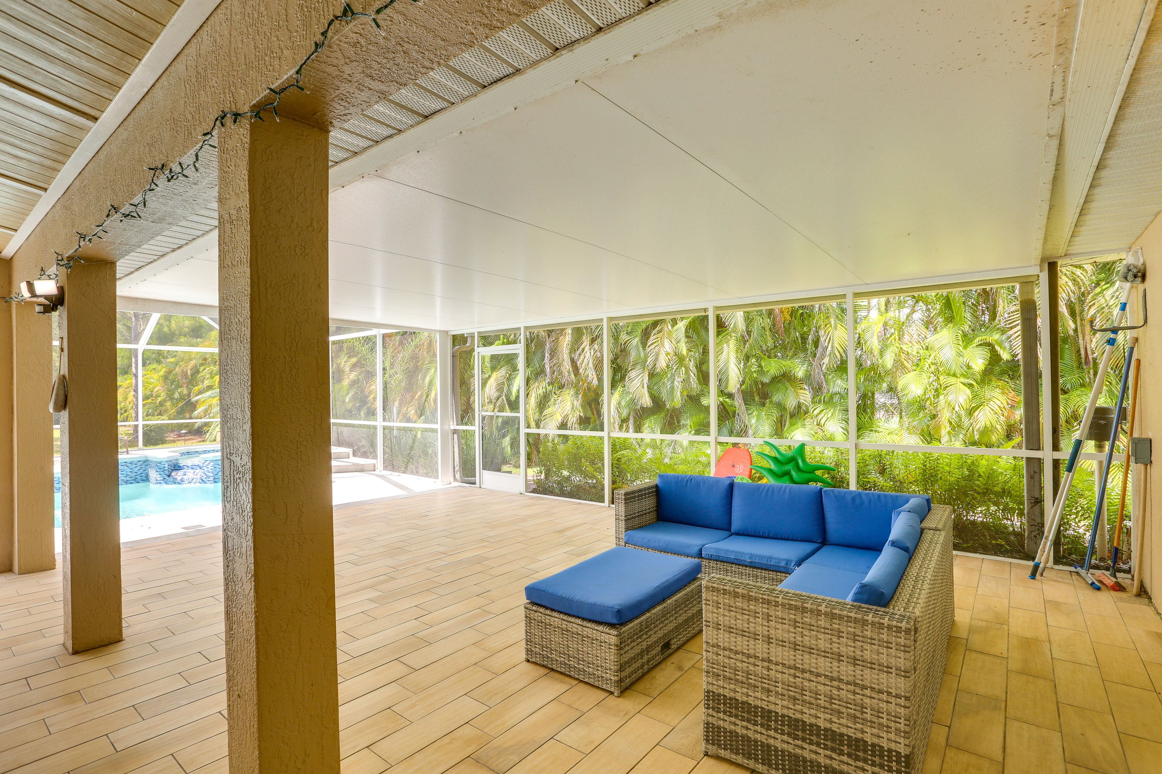 Lanai | Outdoor Dining Table | Rocking Chairs | Ceiling Fan