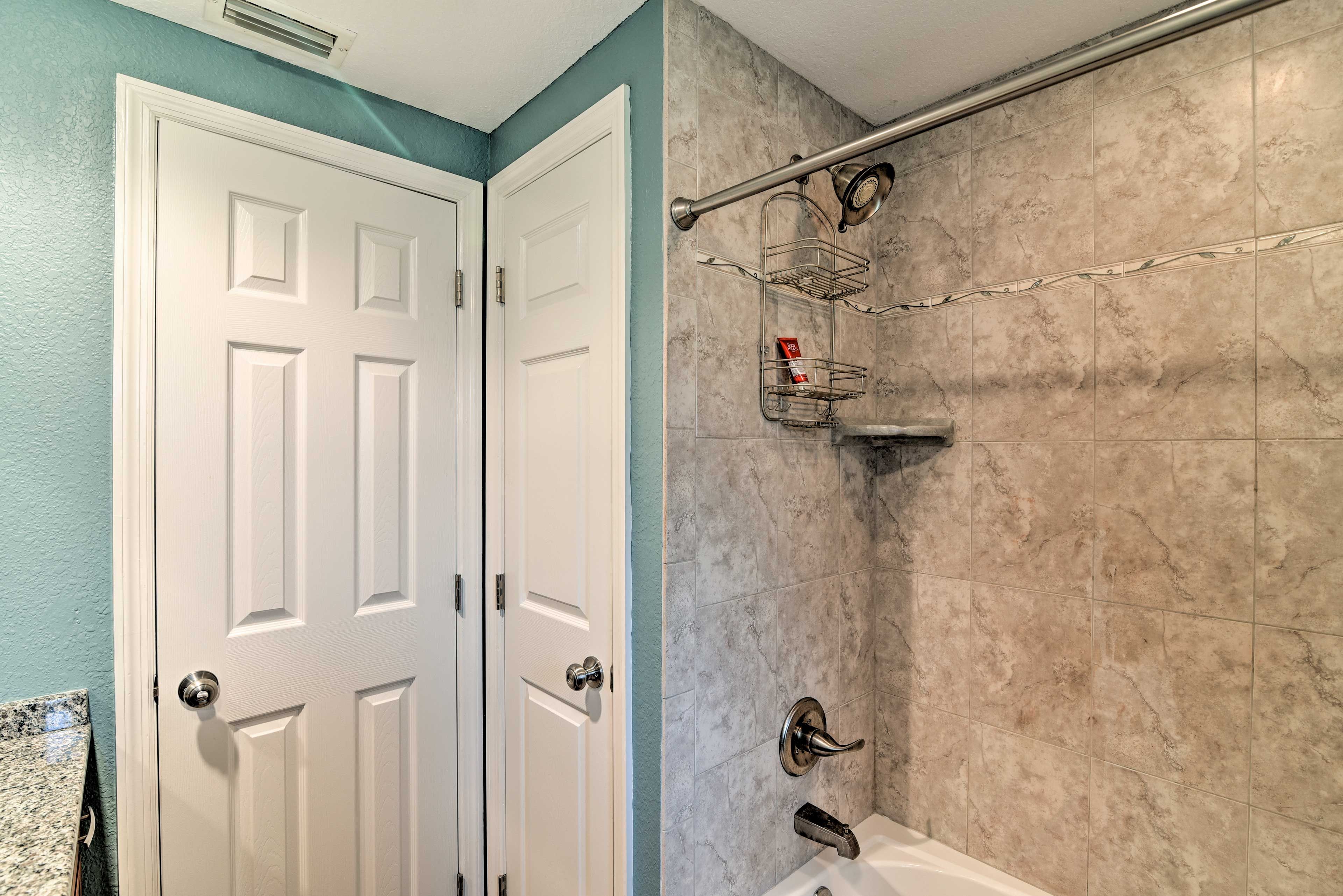 Rinse off the day in the shower/tub combo!