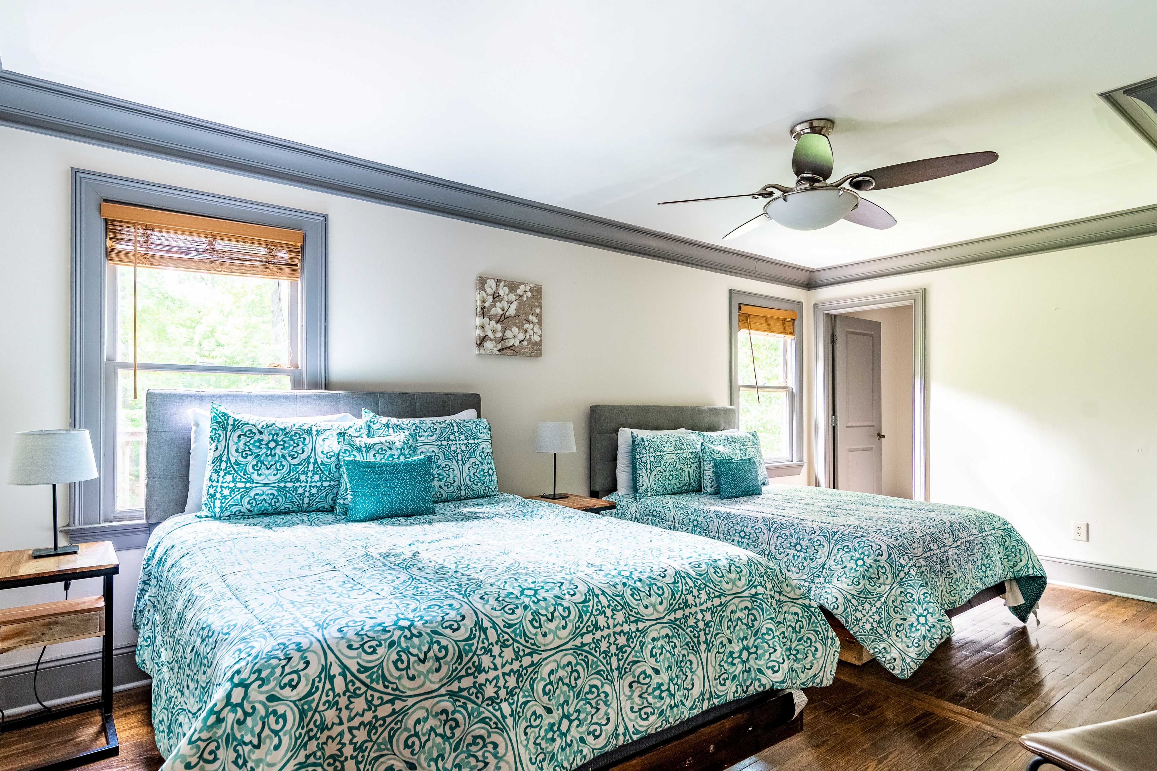 Sleep soundly in this room on the 2 queen beds.