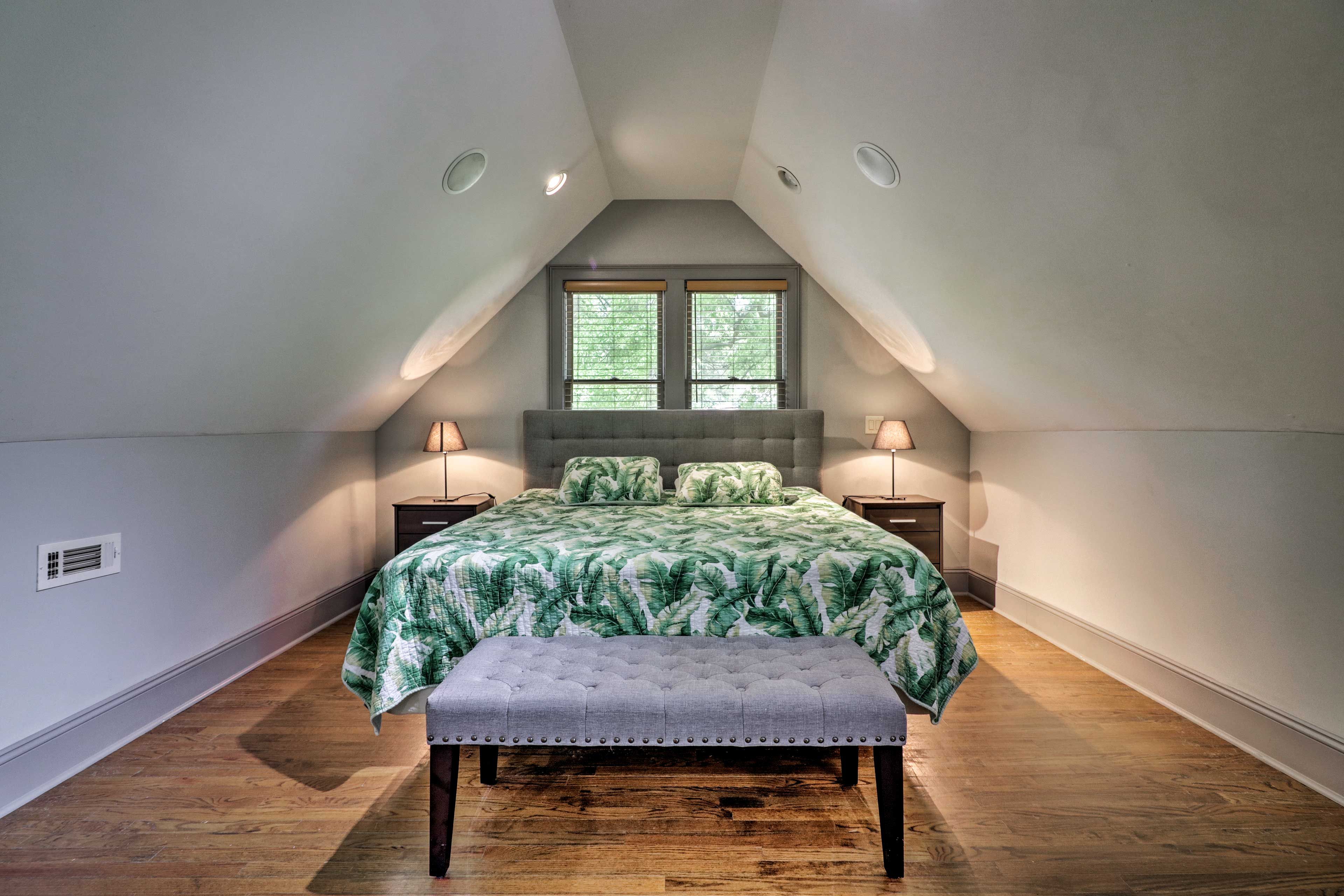 Climb under the covers of the king-sized bed.