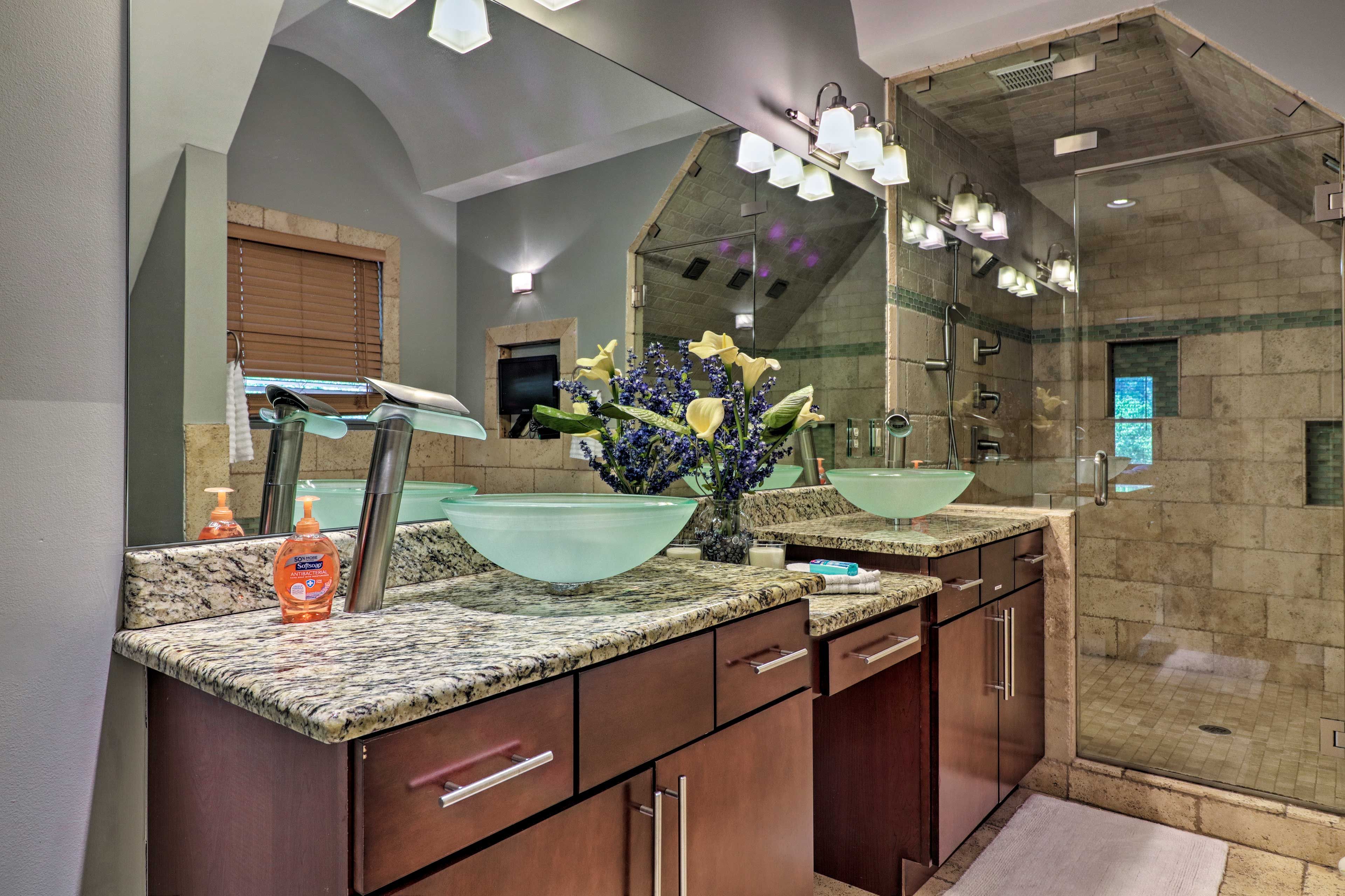 The en-suite bathroom boasts a walk-in shower.