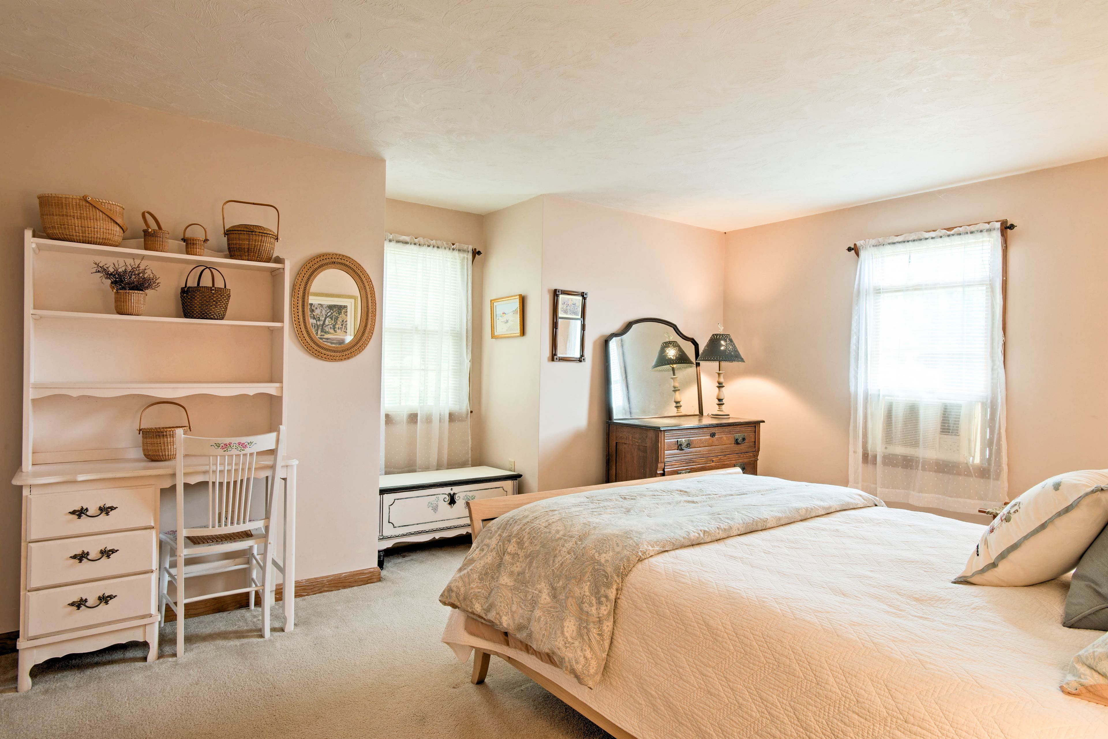 Dive under the covers of the queen bed in the second bedroom.