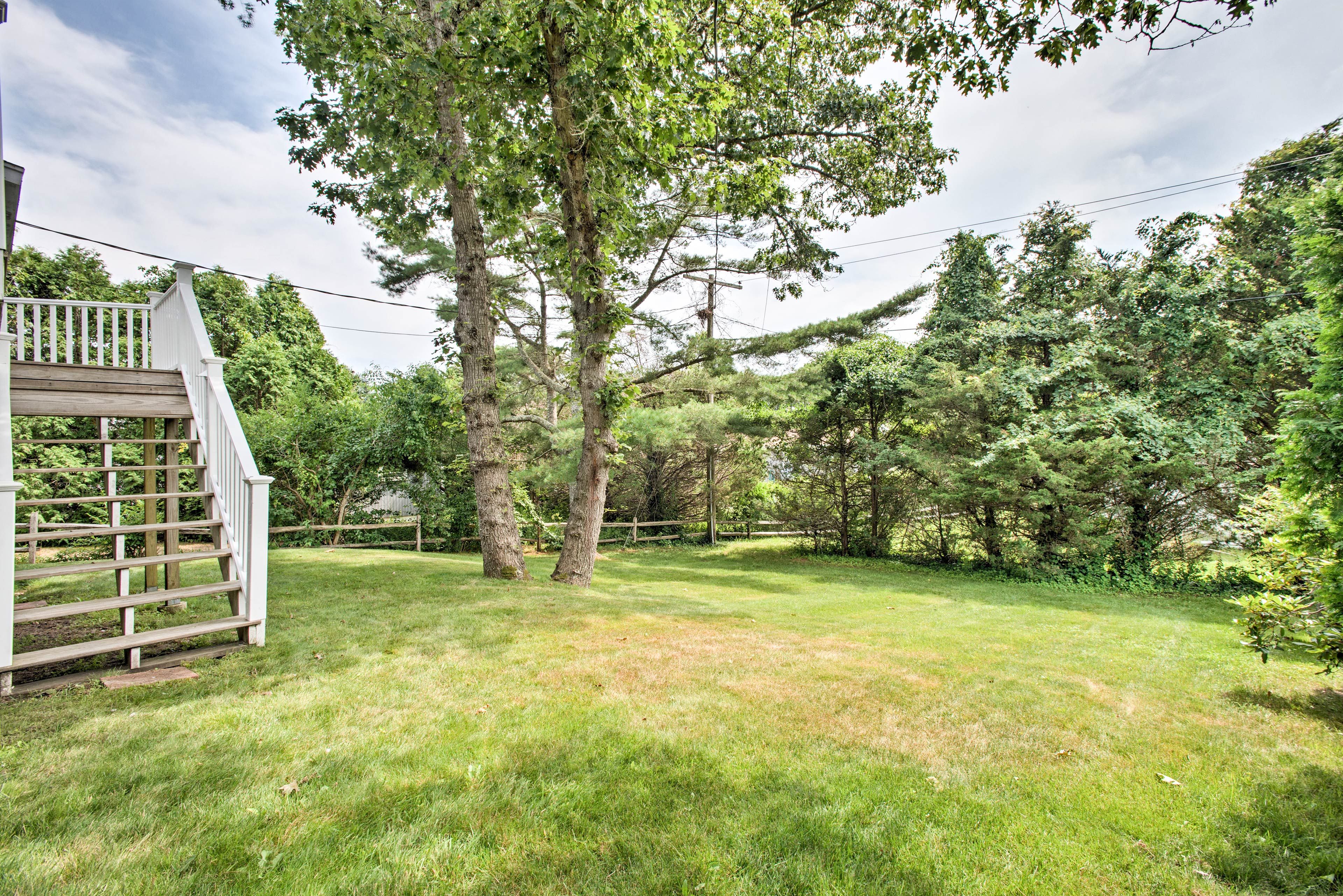 The home offers an outdoor shower to rinse off the sand!