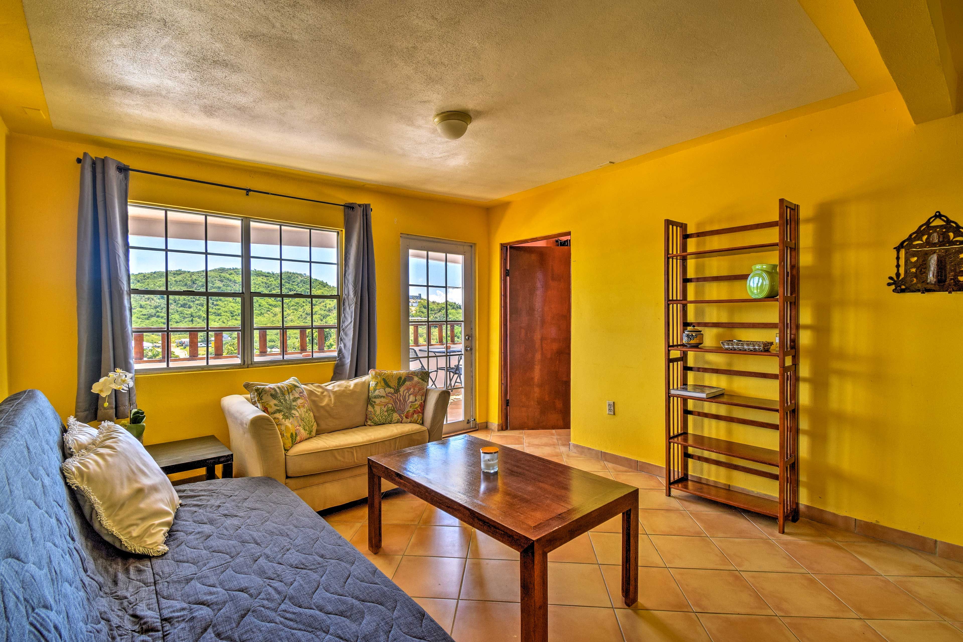 Tiled flooring and natural light flow throughout the interior.