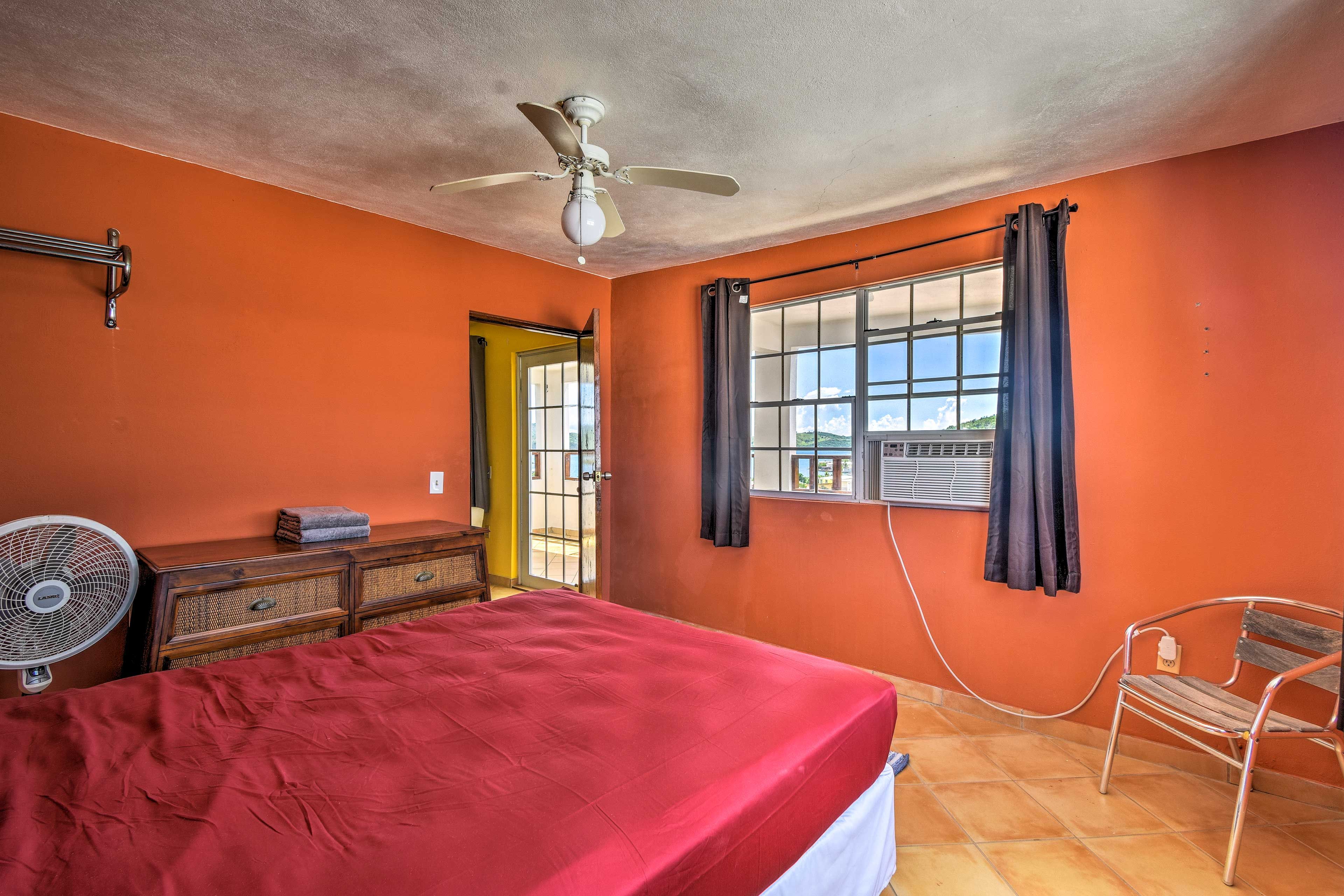 This room includes a window air conditioning unit.