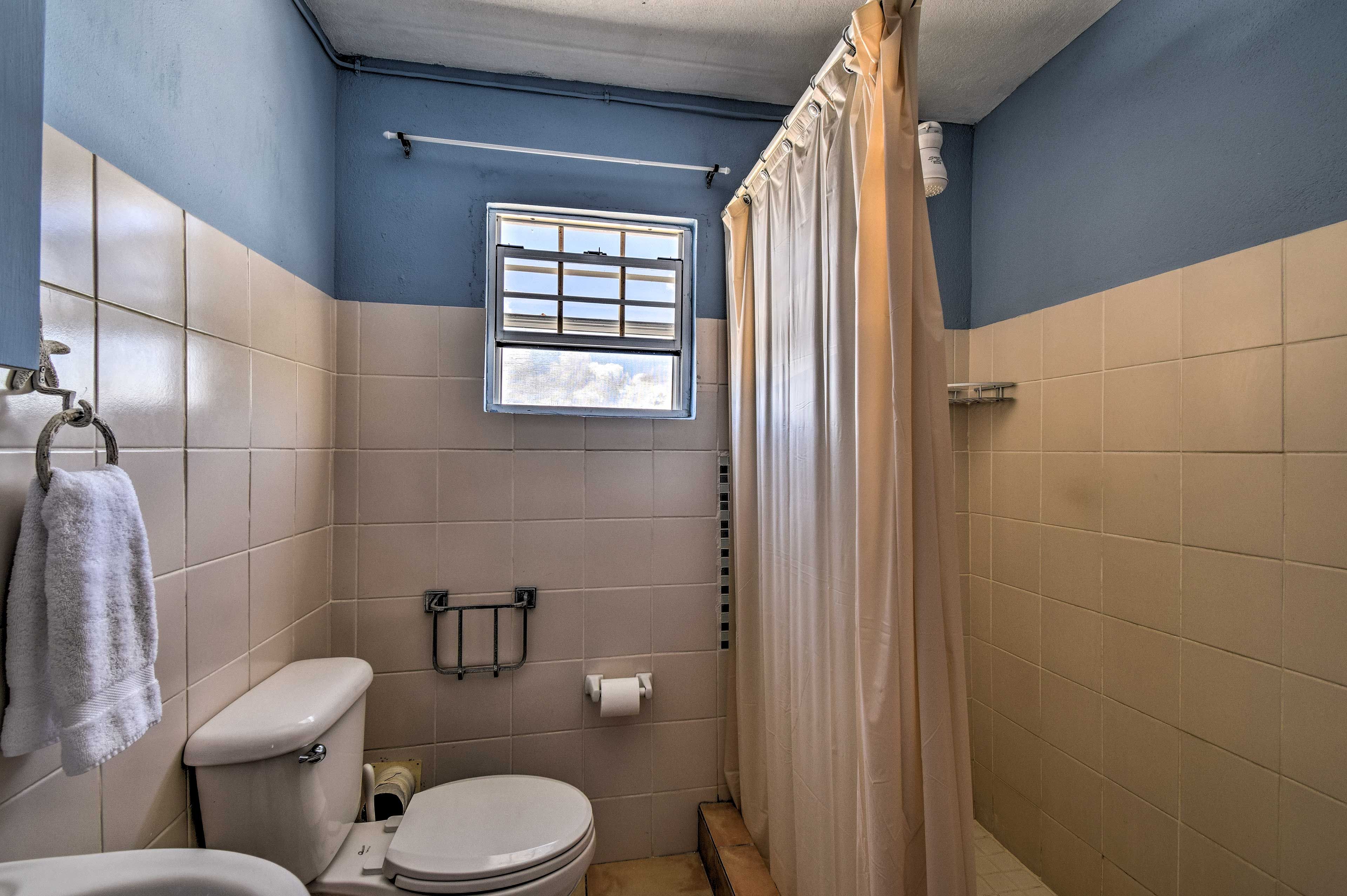 Rinse off in the walk-in shower after a day in the ocean.