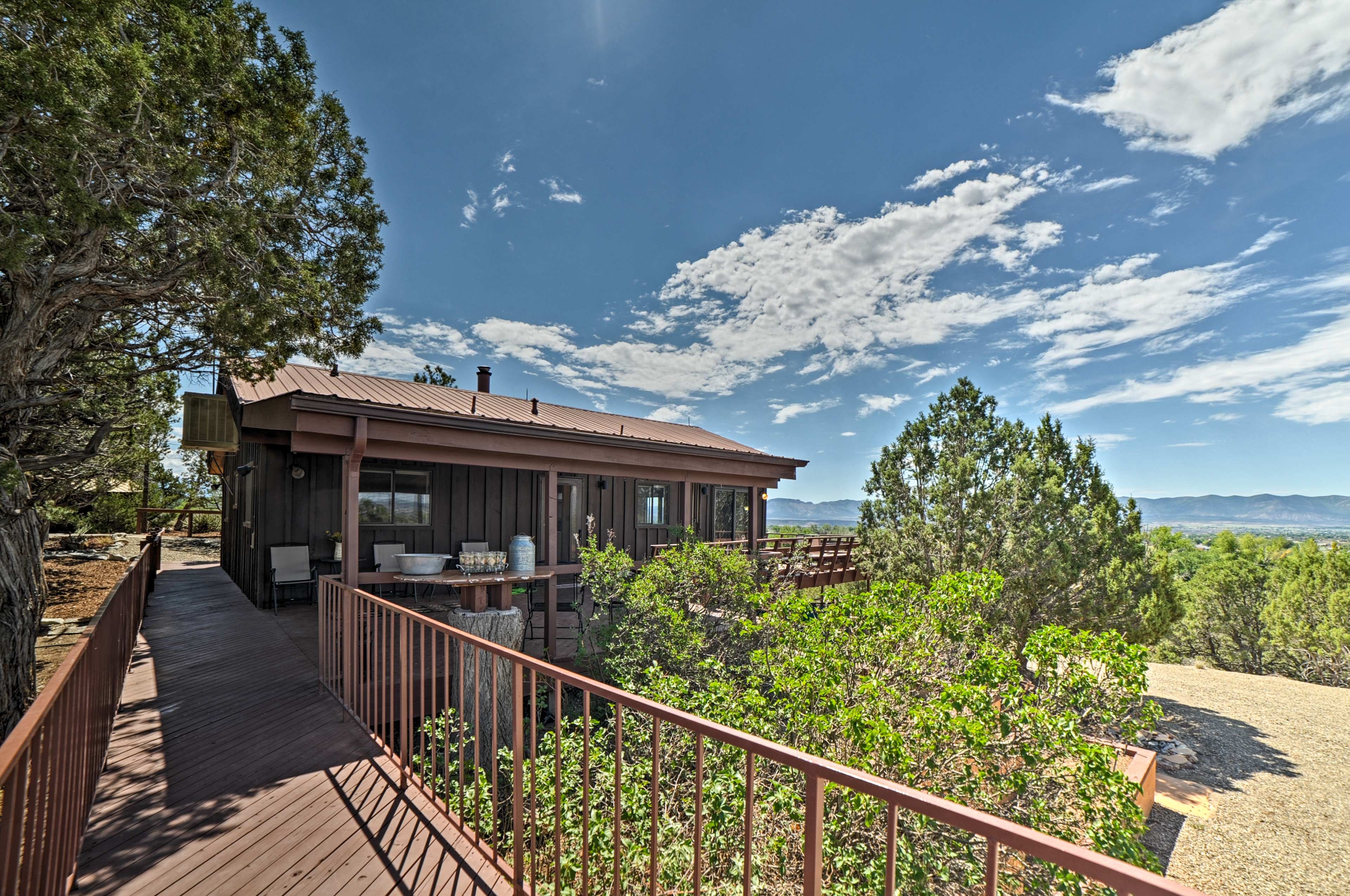 This home reveals dramatic panoramic views of the San Juan Mountains!