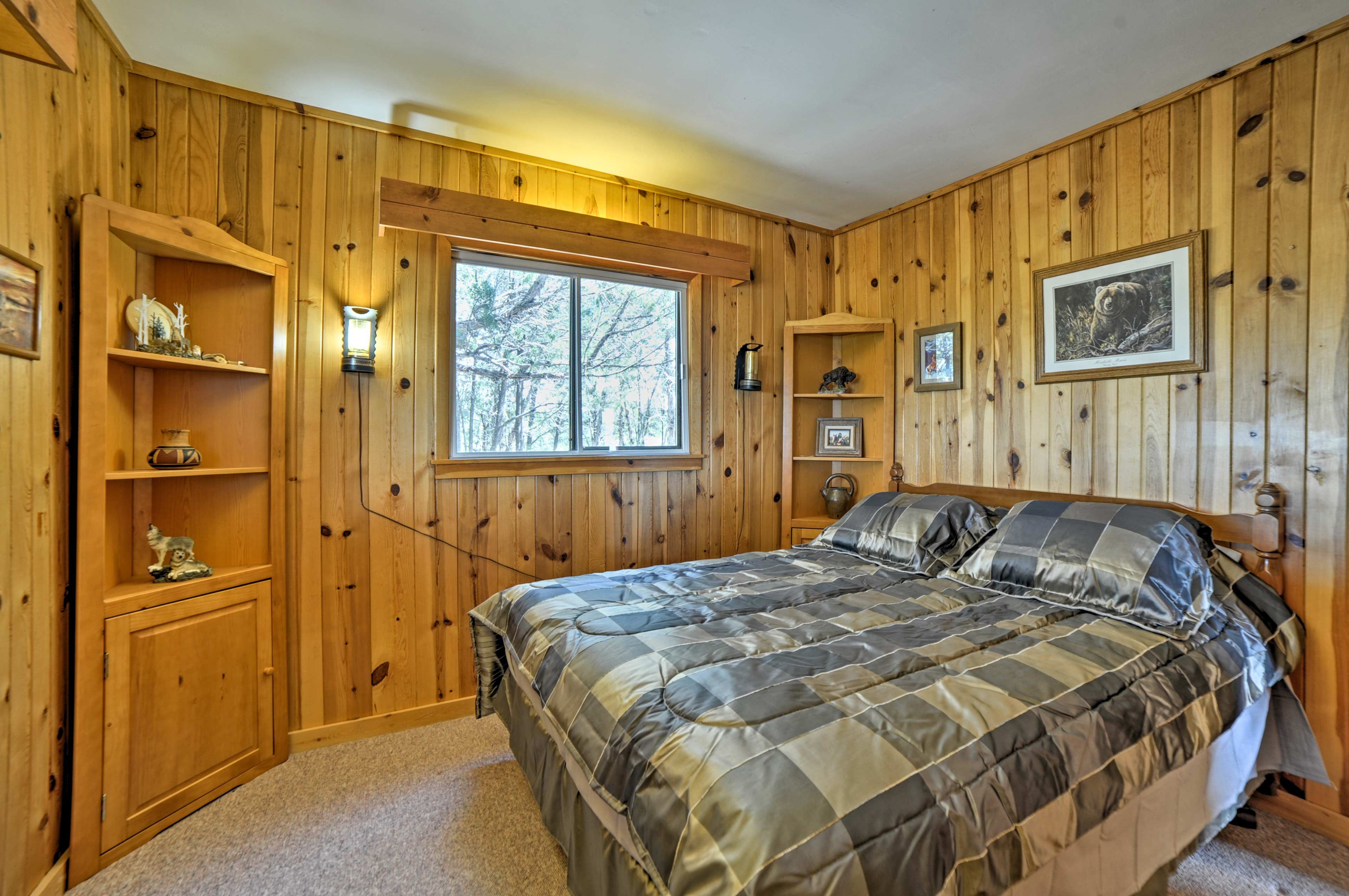 Wood-paneled walls create a cozy cabin ambiance.