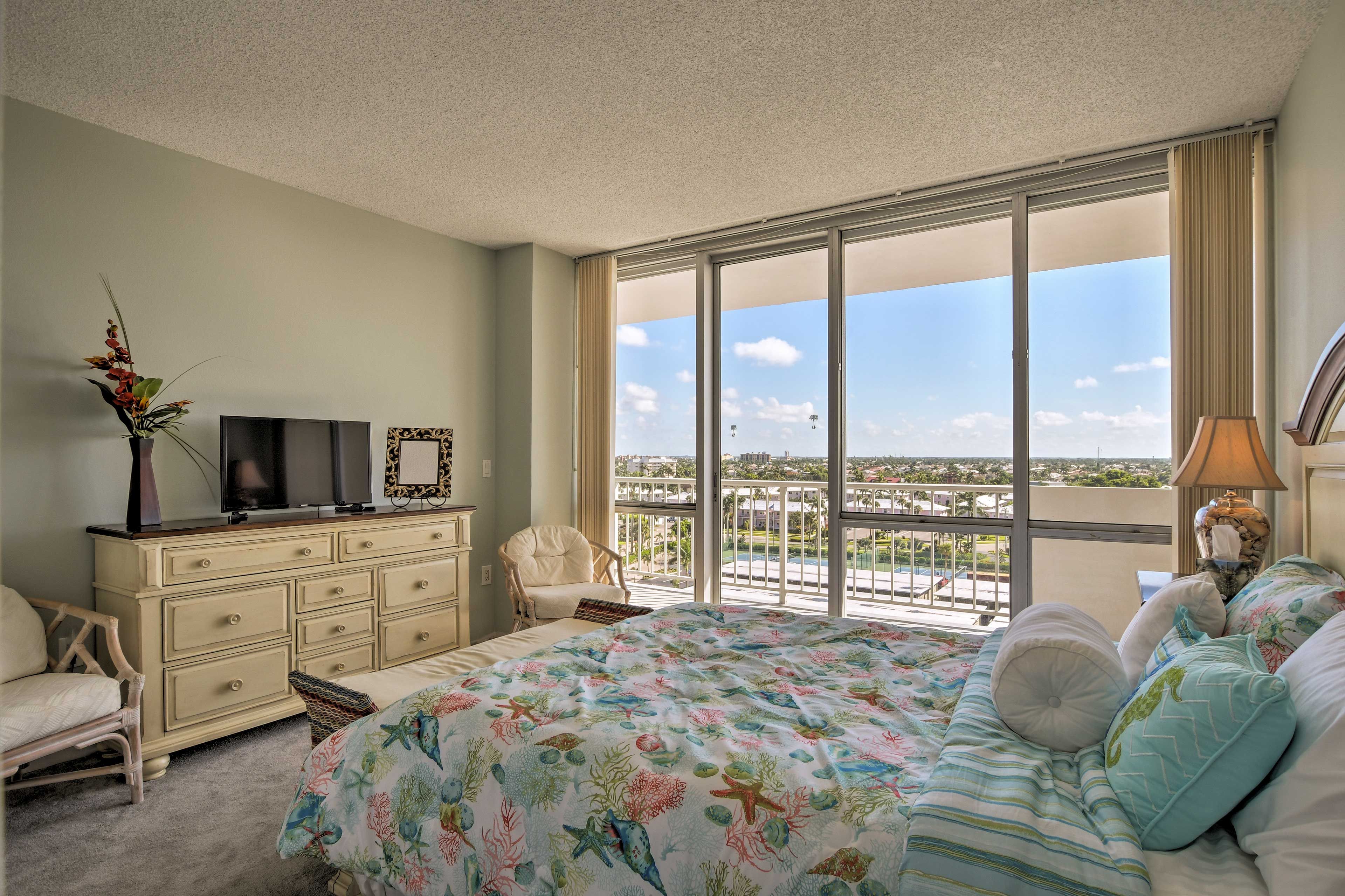 Watch a show from under the covers of this queen-sized bed.