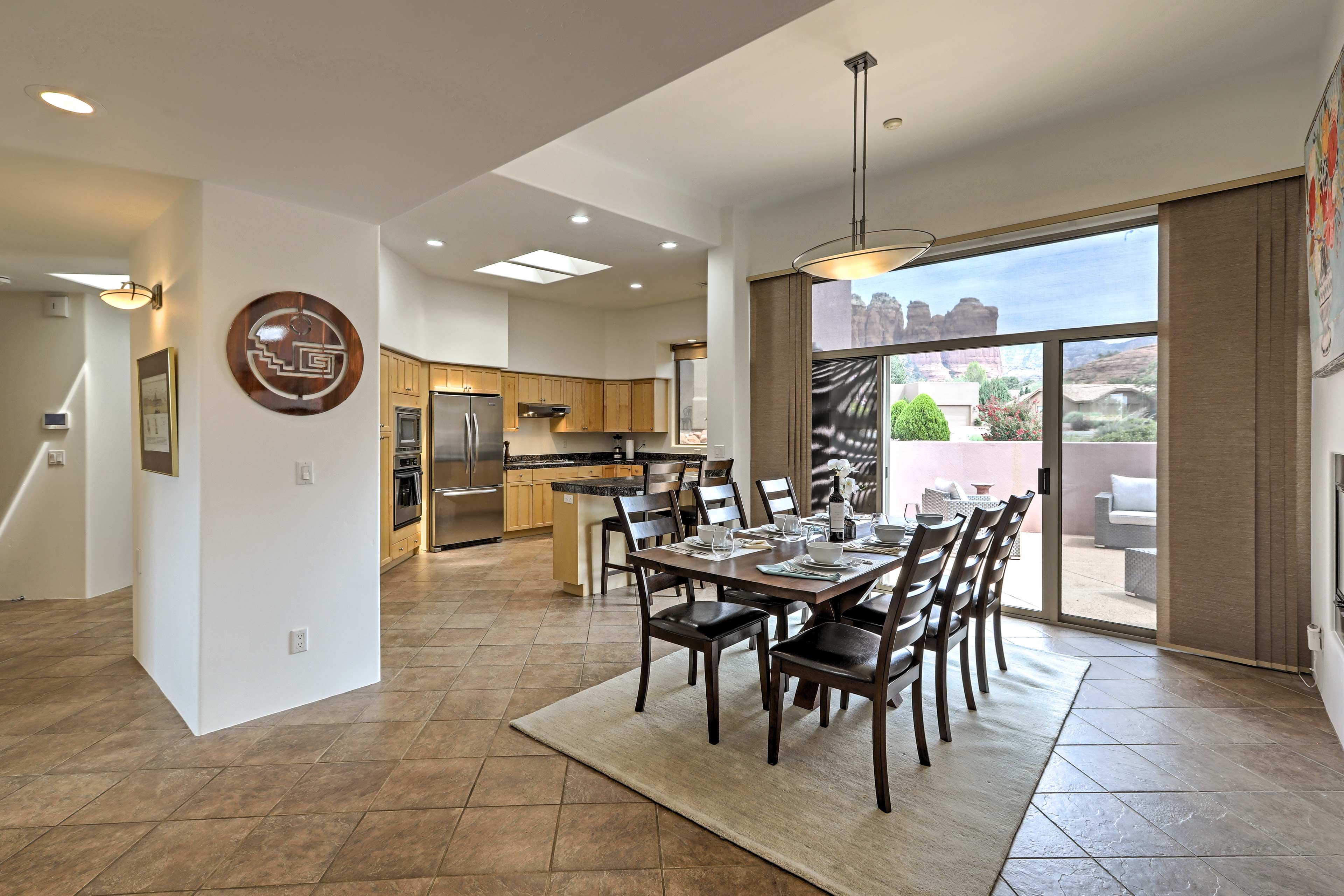 Enjoy a good meal with great company at this sleek dining table.