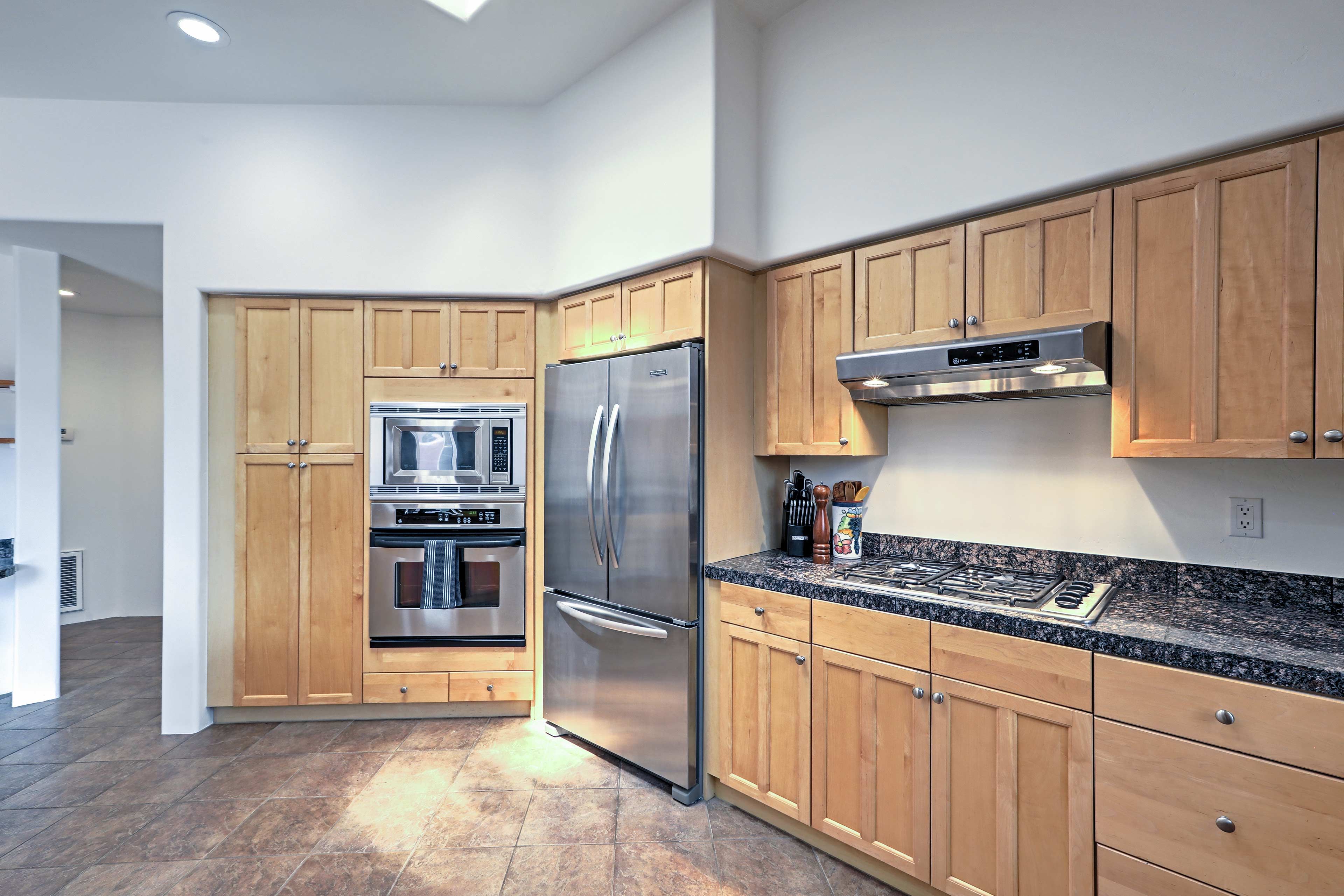 The kitchen comes fully equipped with state-of-the-art appliances.
