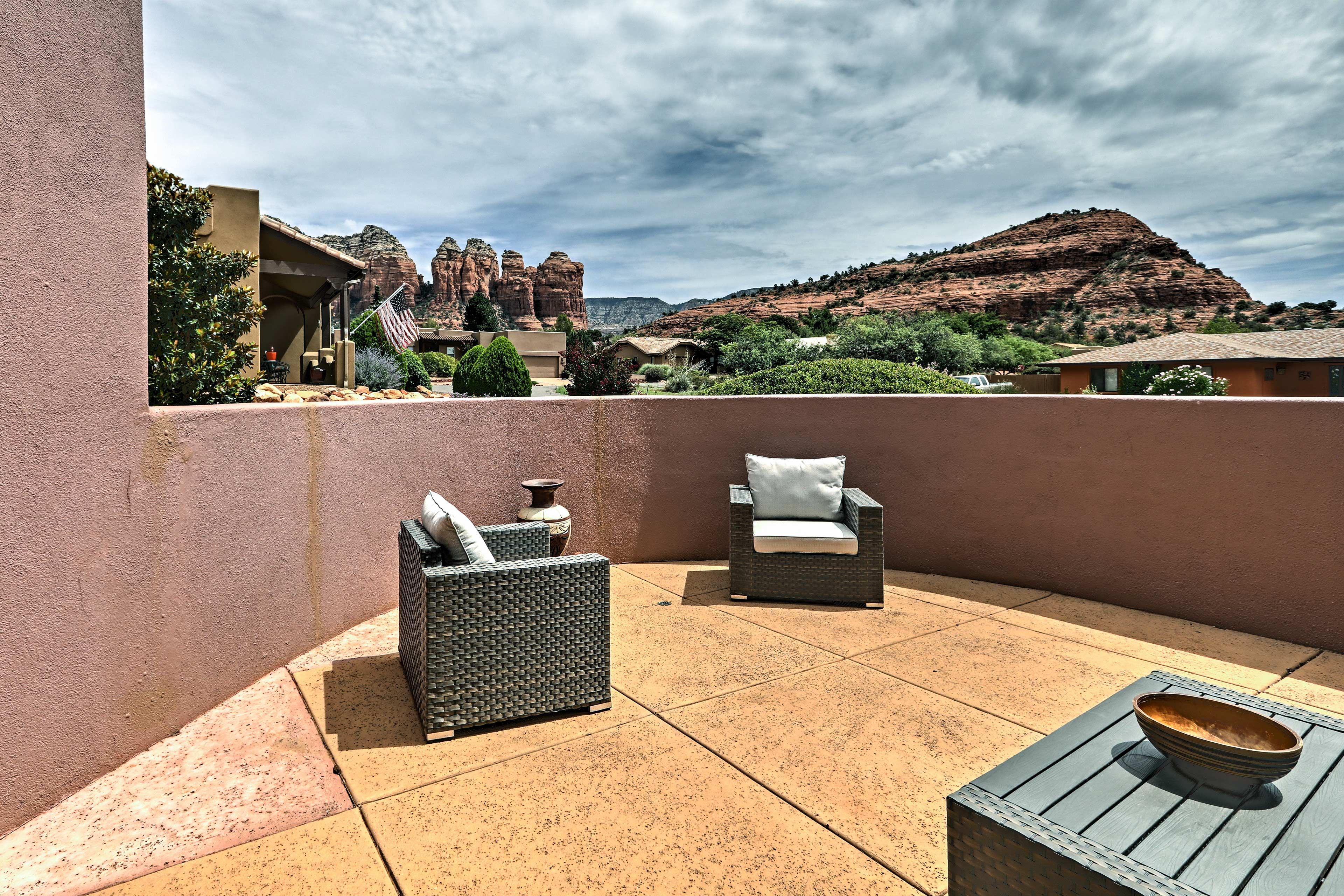 Admire the surrounding scenery from this furnished outdoor space.