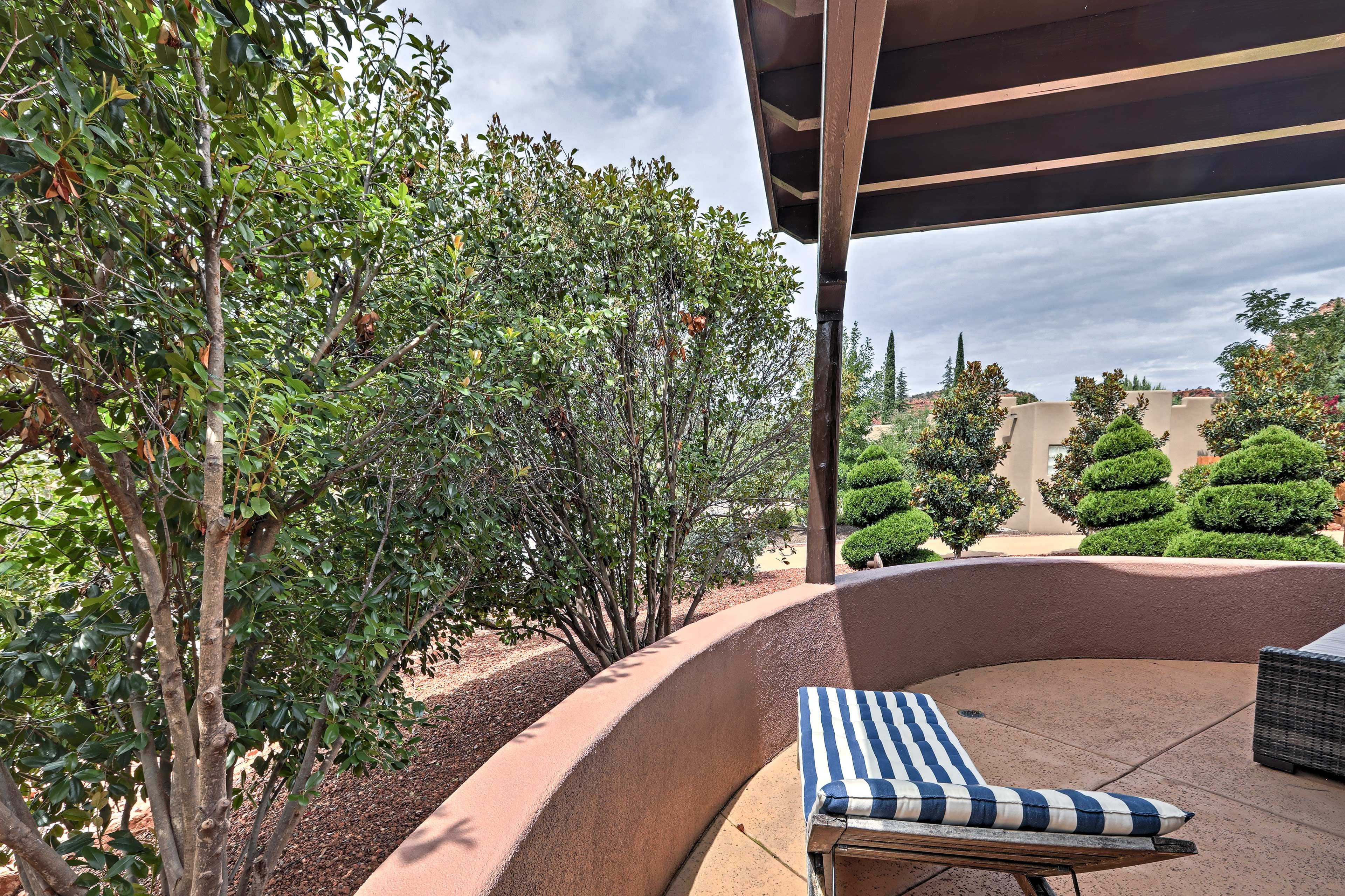 This enchanting outdoor space is shared between the second and third bedrooms.