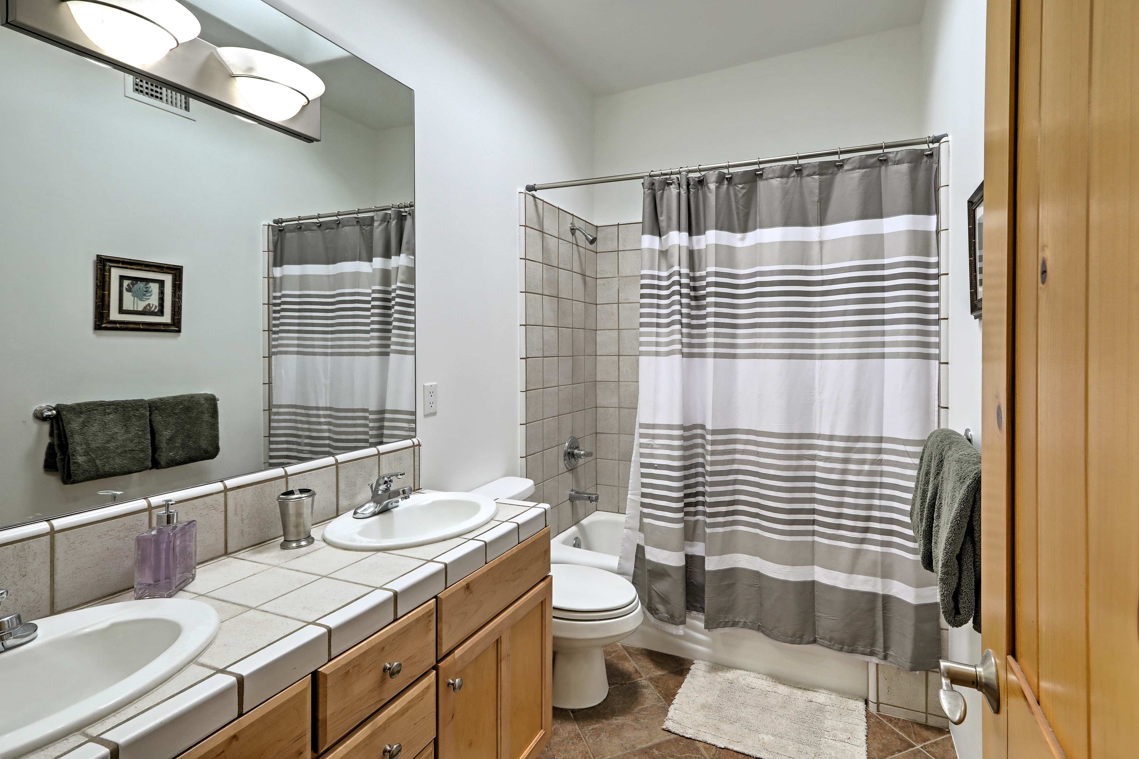 After a long day on the trails, refresh in this full bathroom.