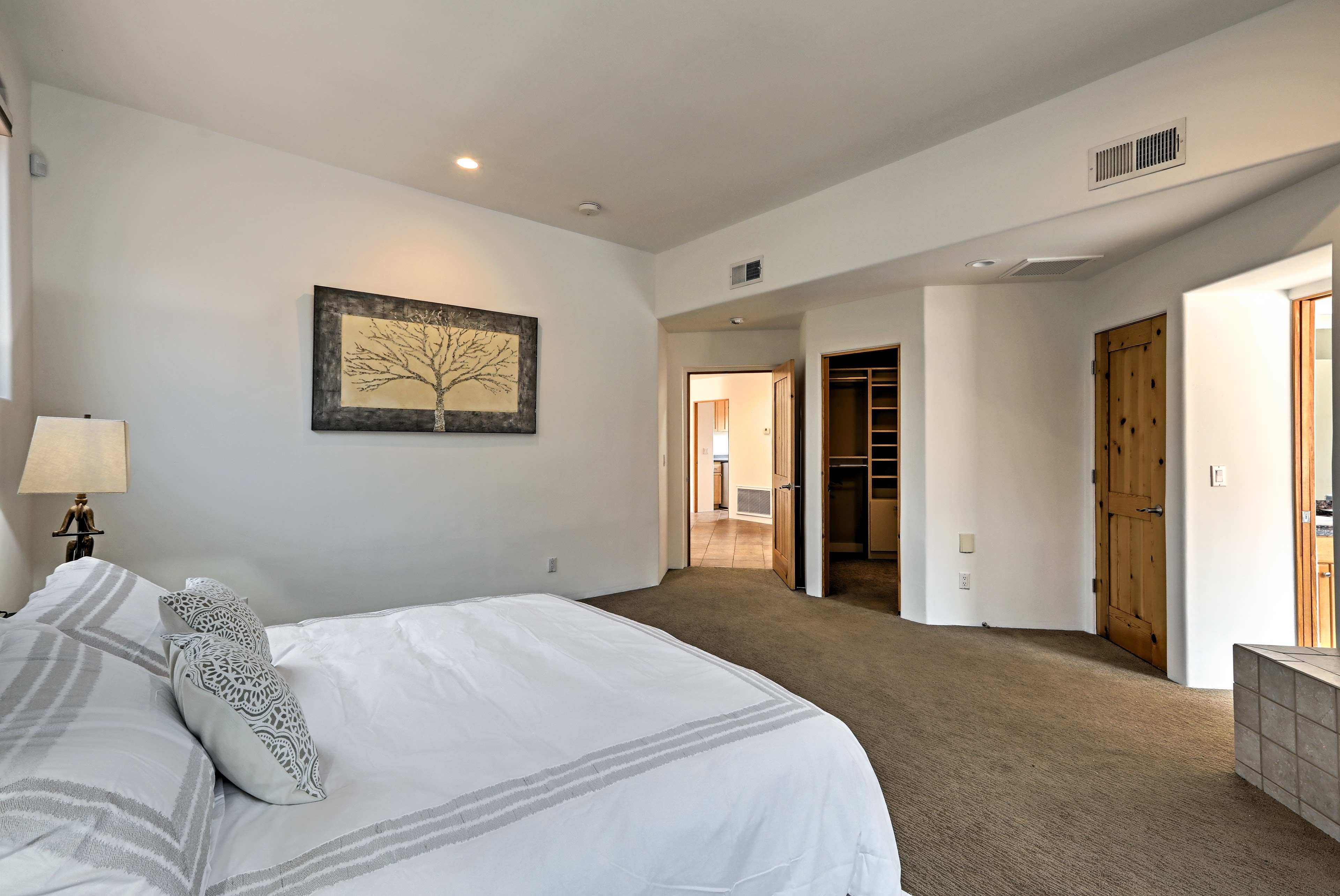 The primary bedroom also boasts a large walk-in closet.