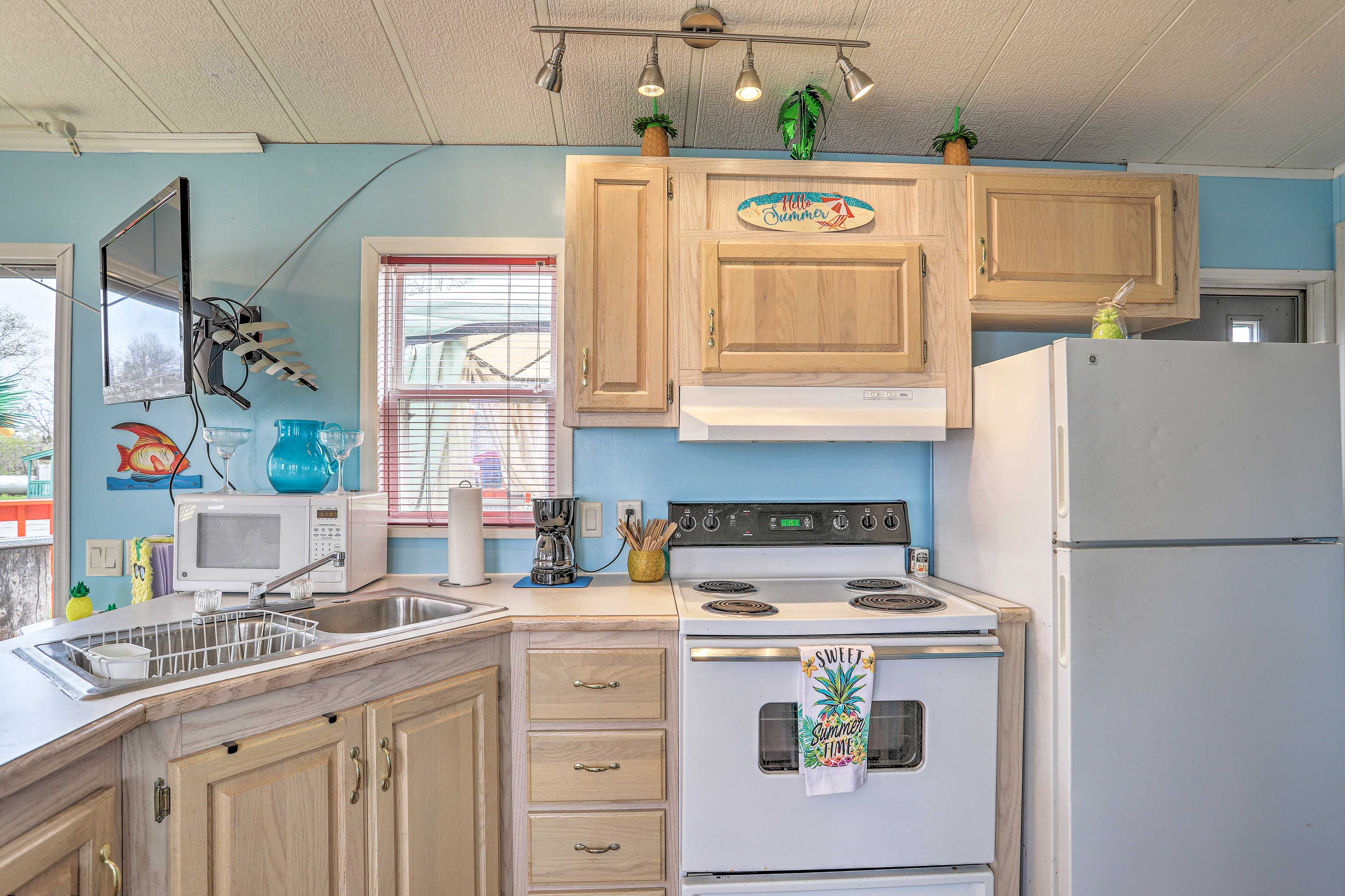 Grab your chef's apron for a homemade meal in the well-equipped kitchen.