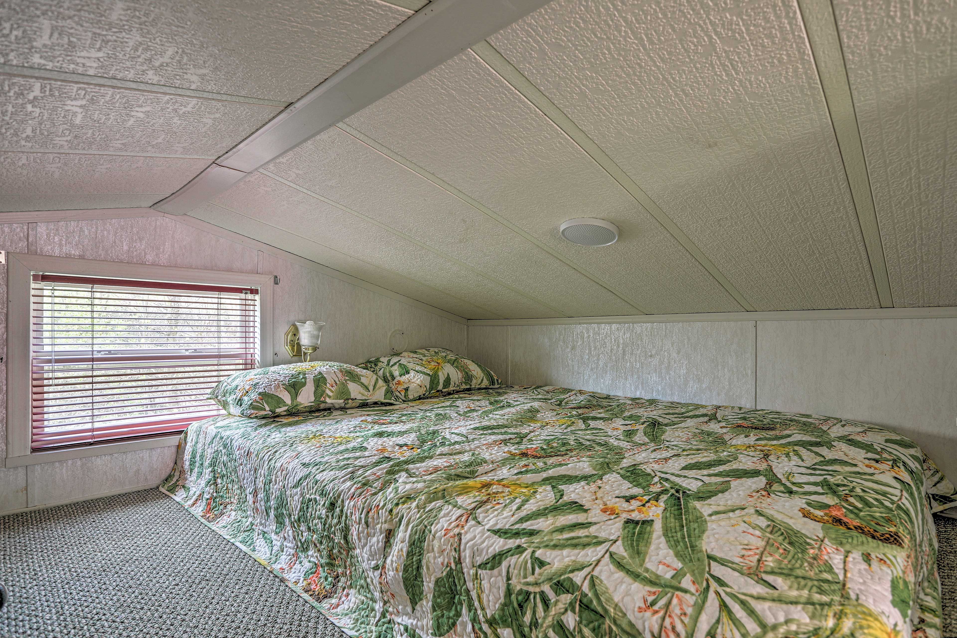 Curl up for the night in the queen-sized bed.