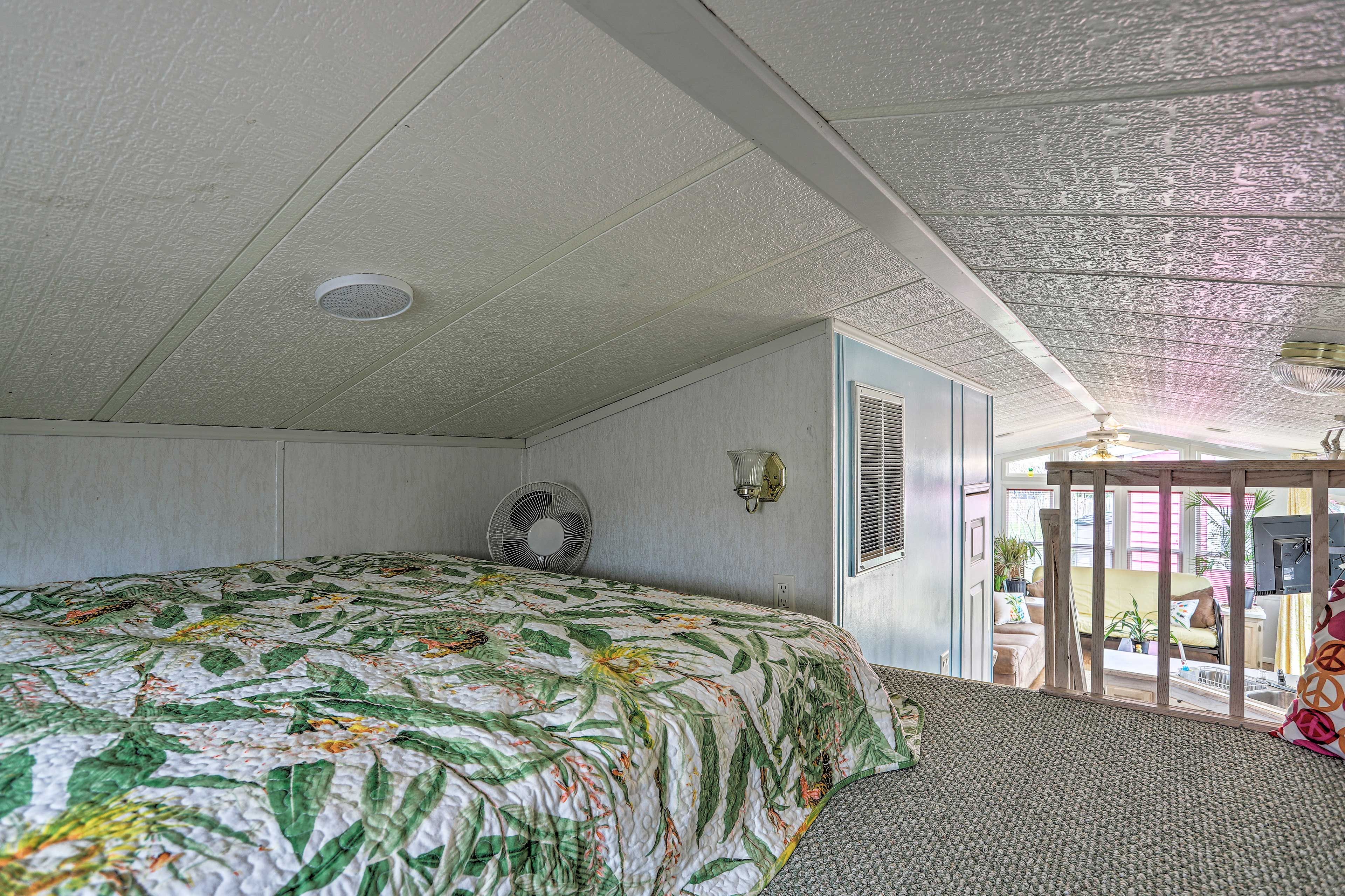 Find your cozy nook in this home's loft.