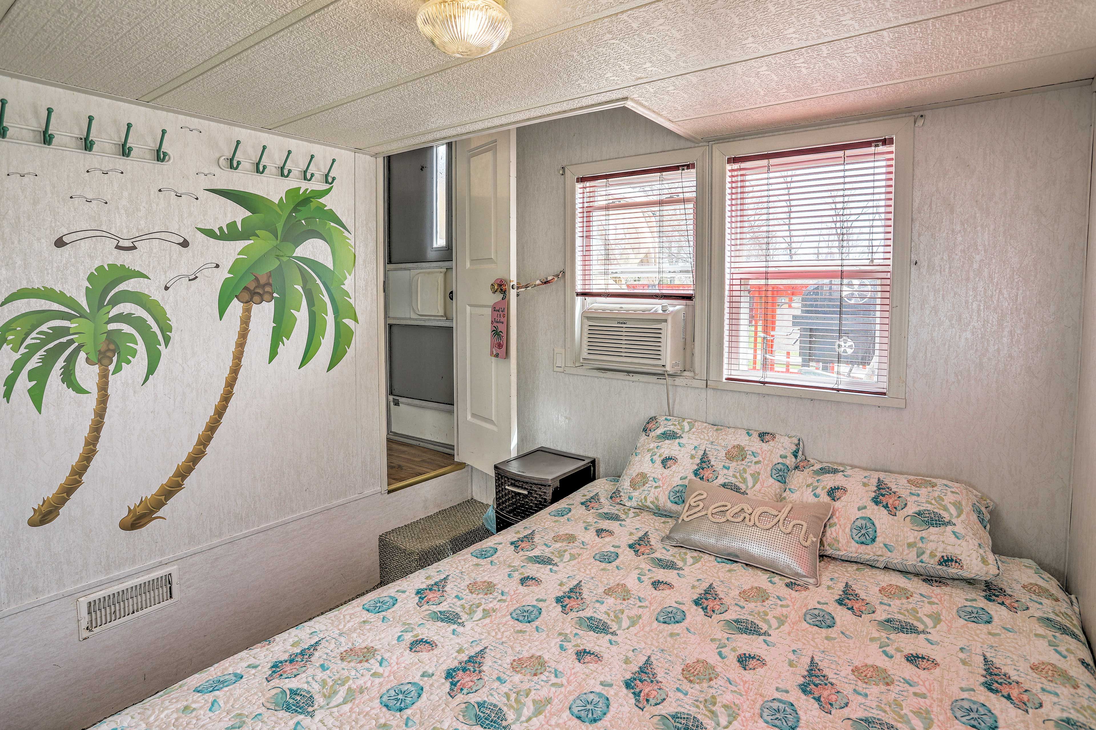 Stay cool in this air-conditioned bedroom.
