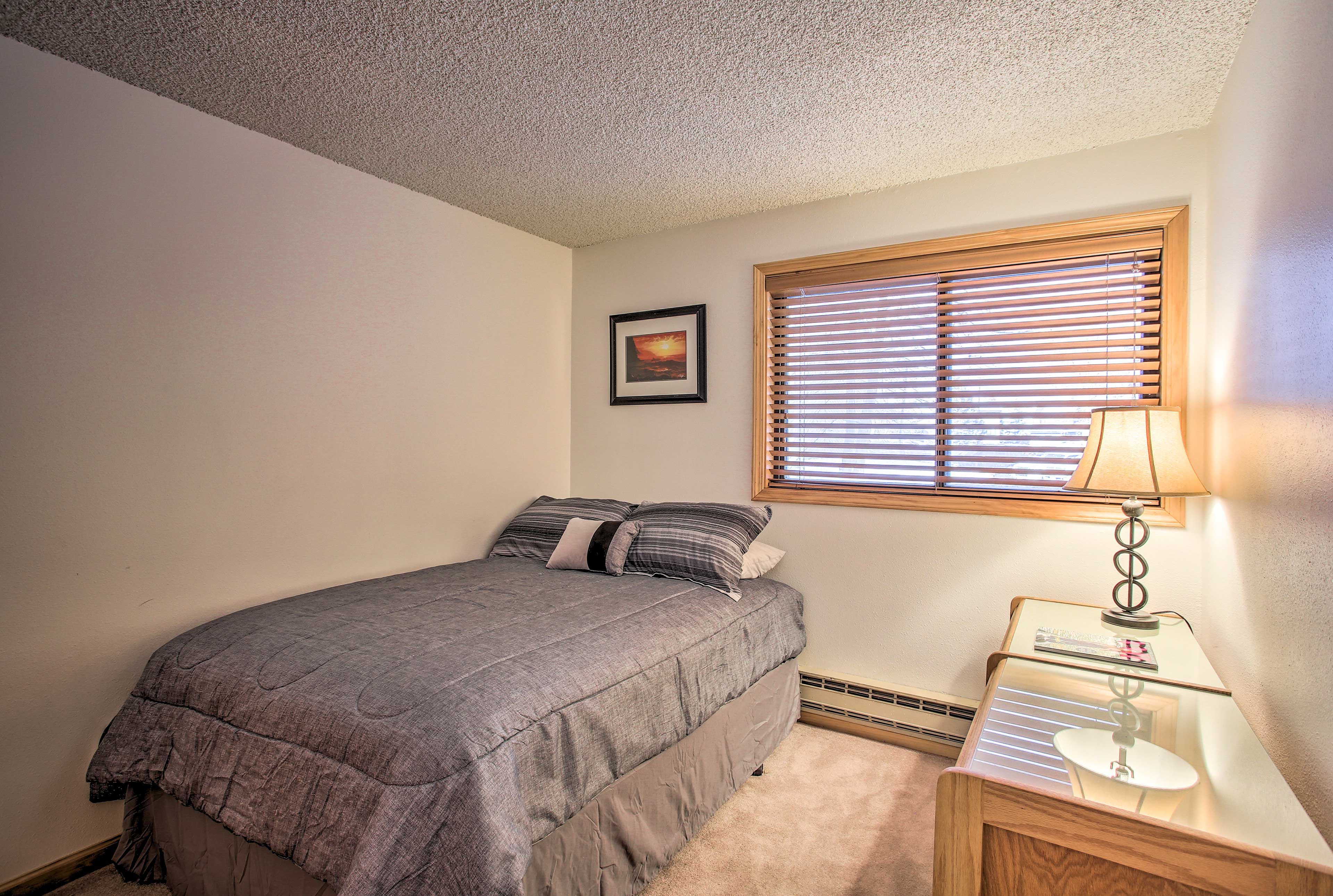 Bedroom 2 is outfitted with a full bed.