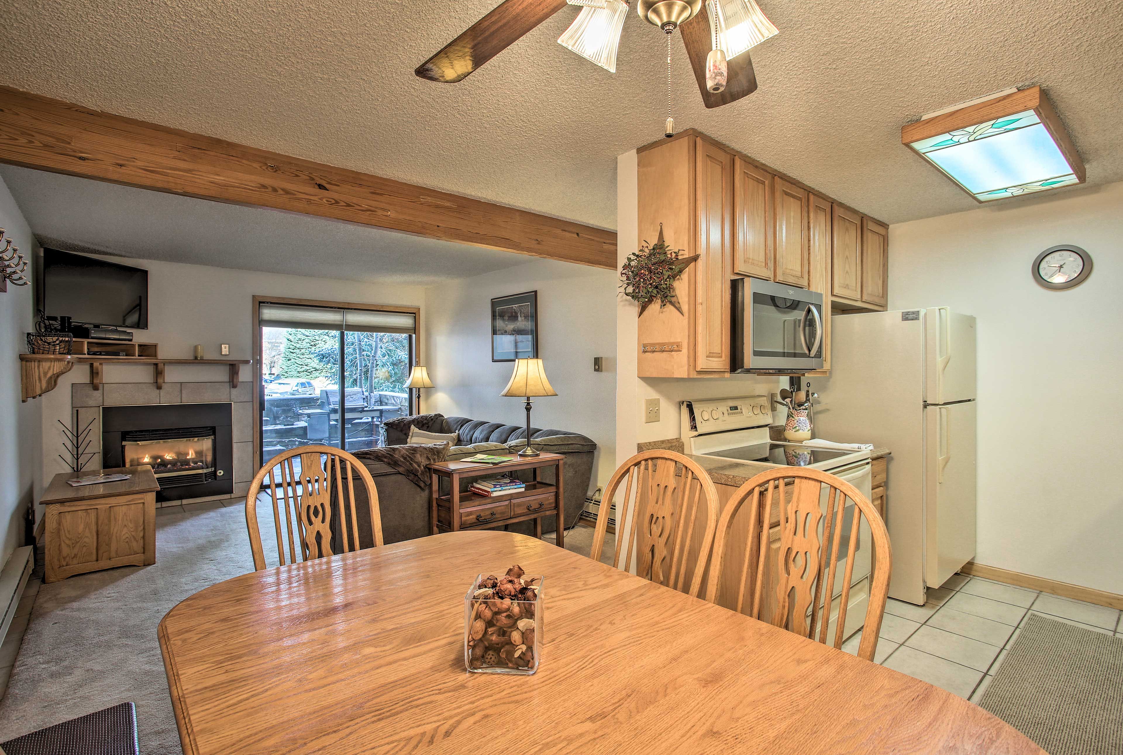 Gather the group for a family dinner around the elegant dining table.