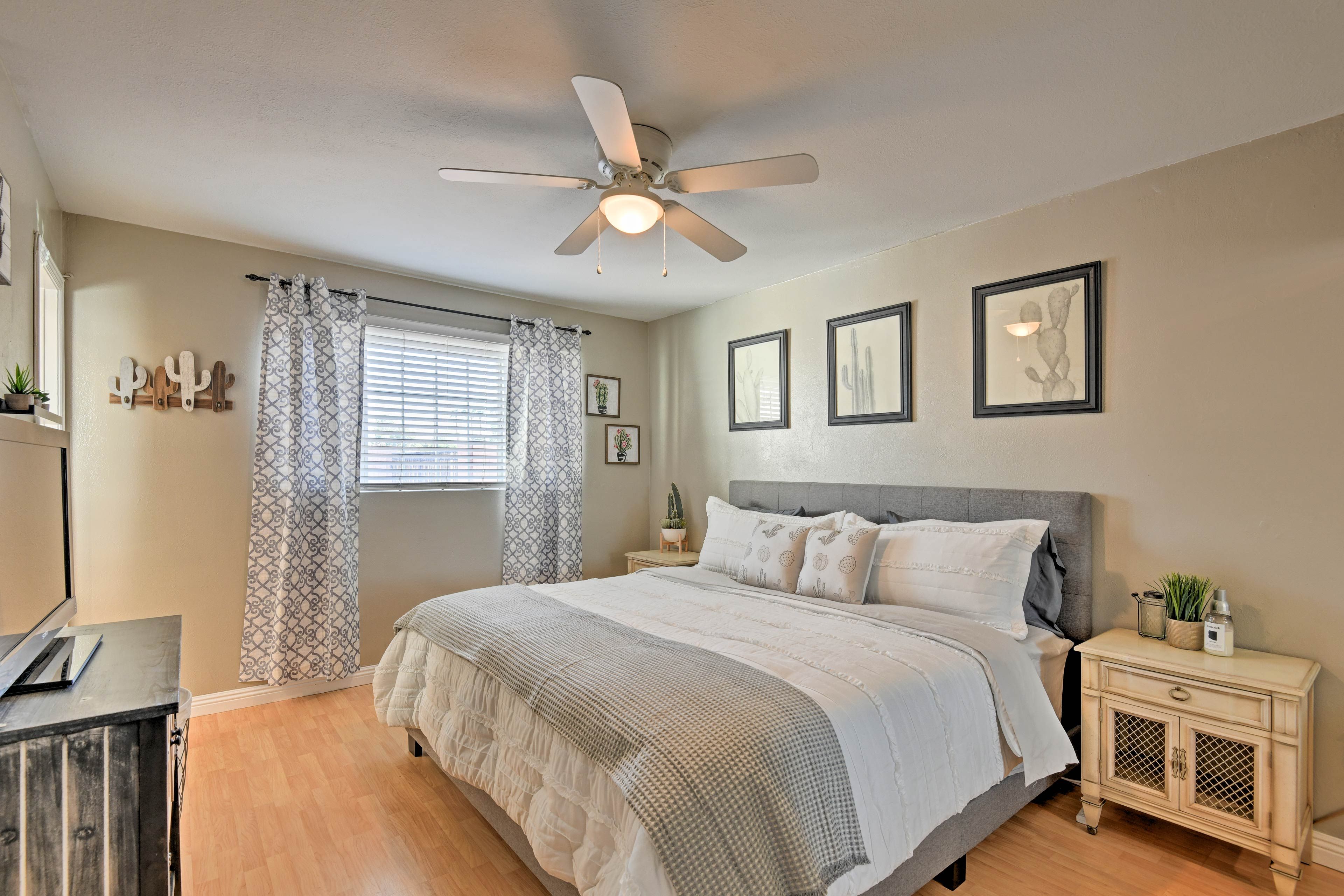 This bedroom boasts a high-end king bed.