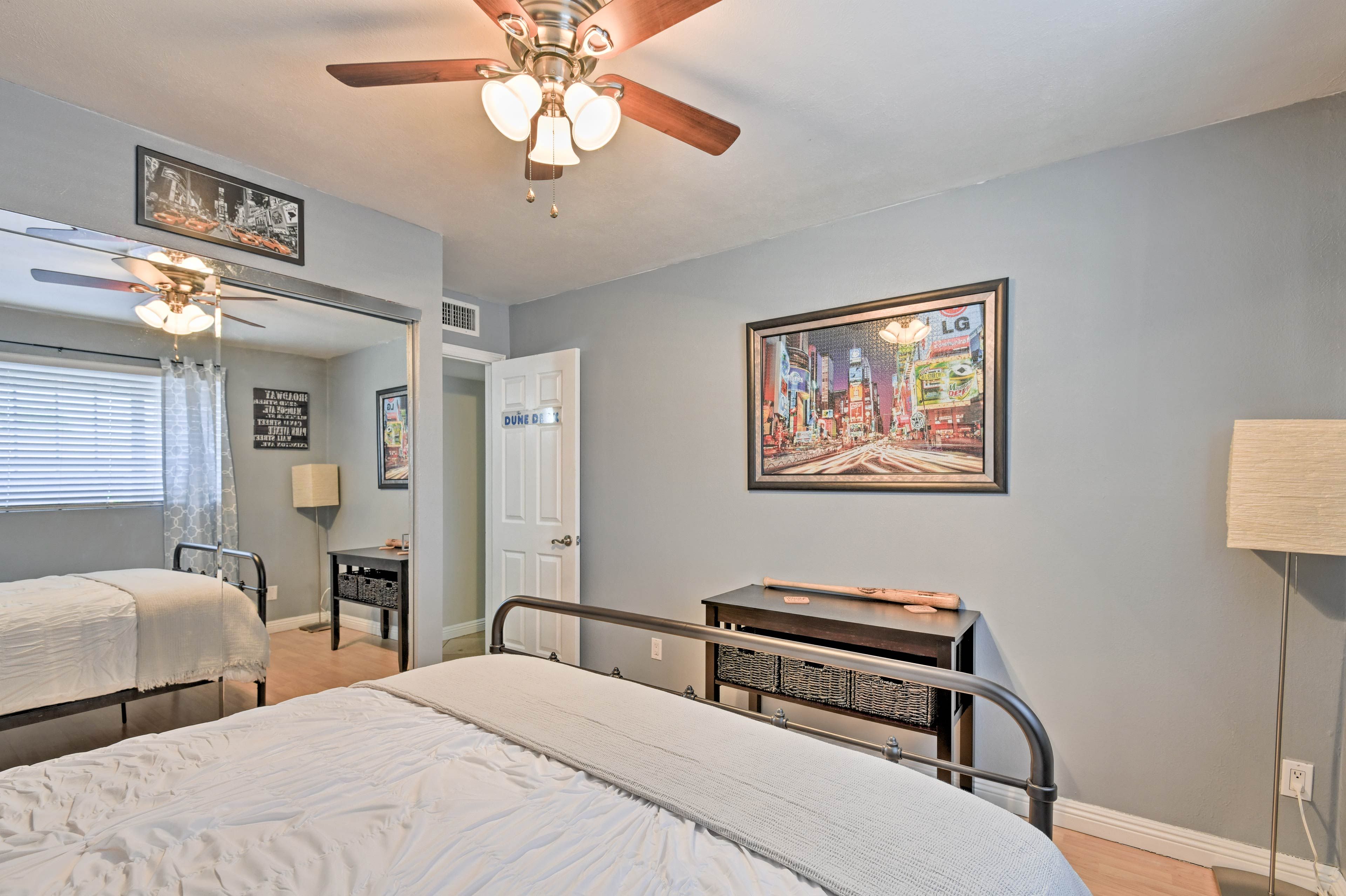 Two guests can share the comfort of this queen-sized bed.