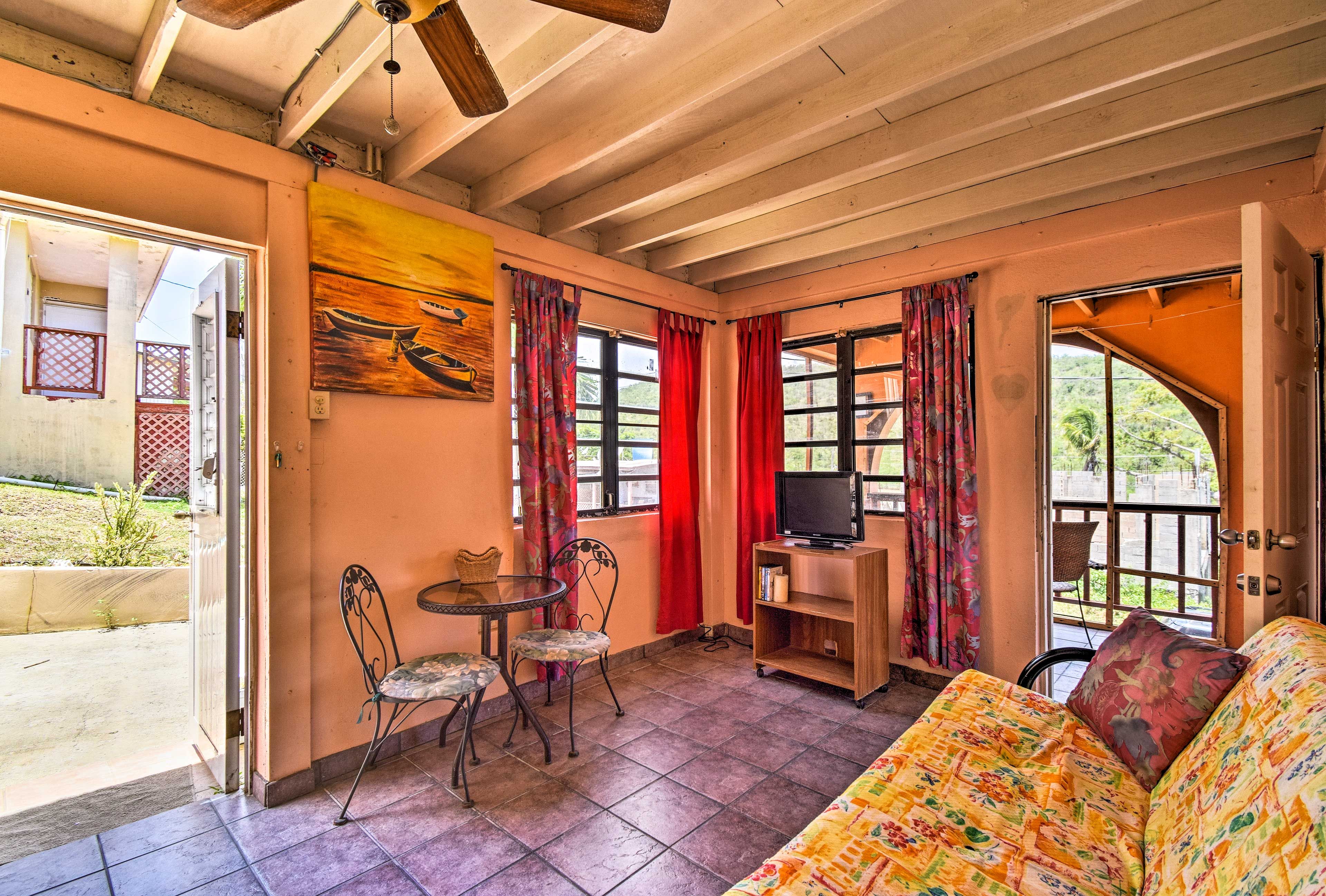 Natural light illuminates the interior of this open and airy abode.