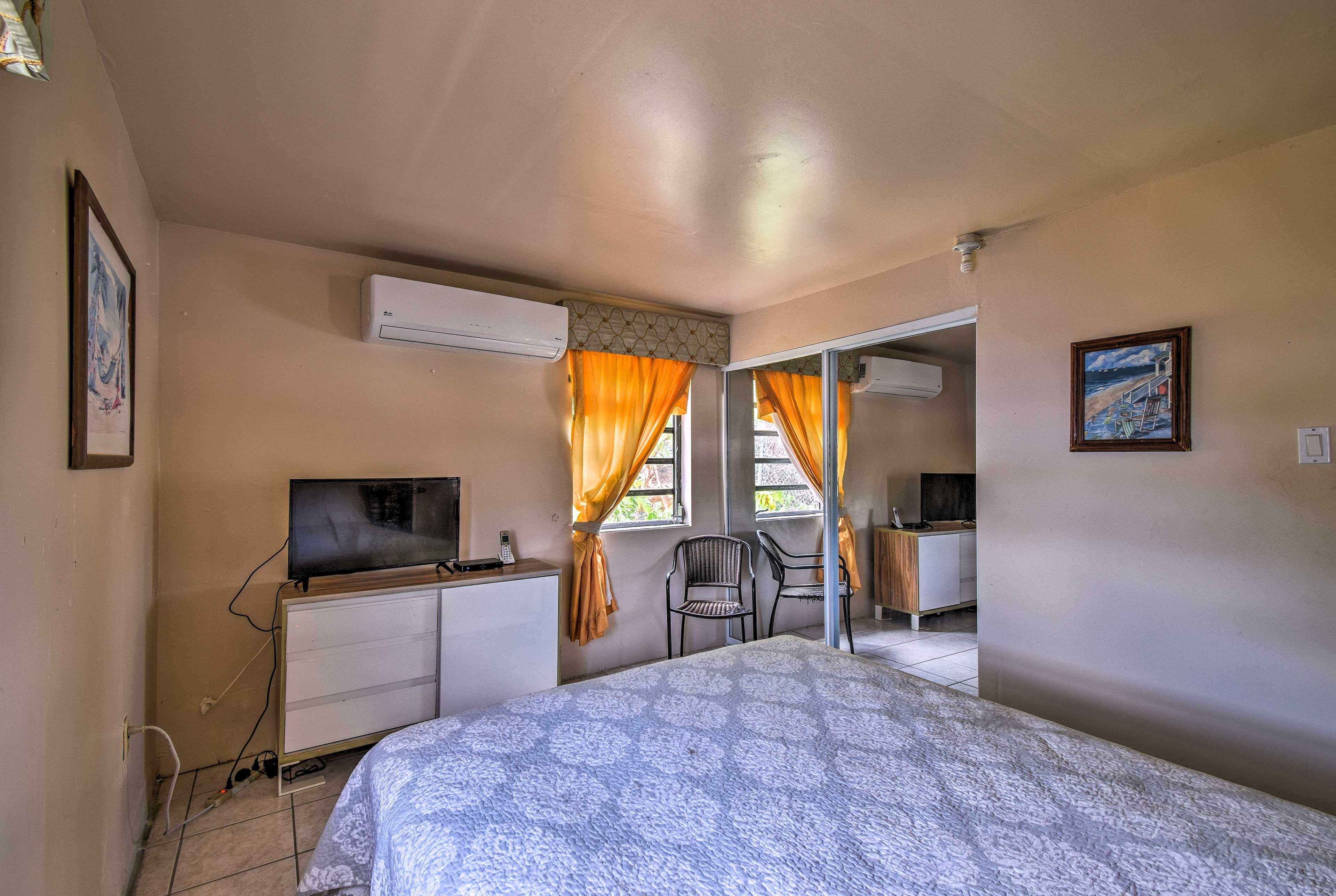 Turn on the air conditioner and the flat-screen TV!