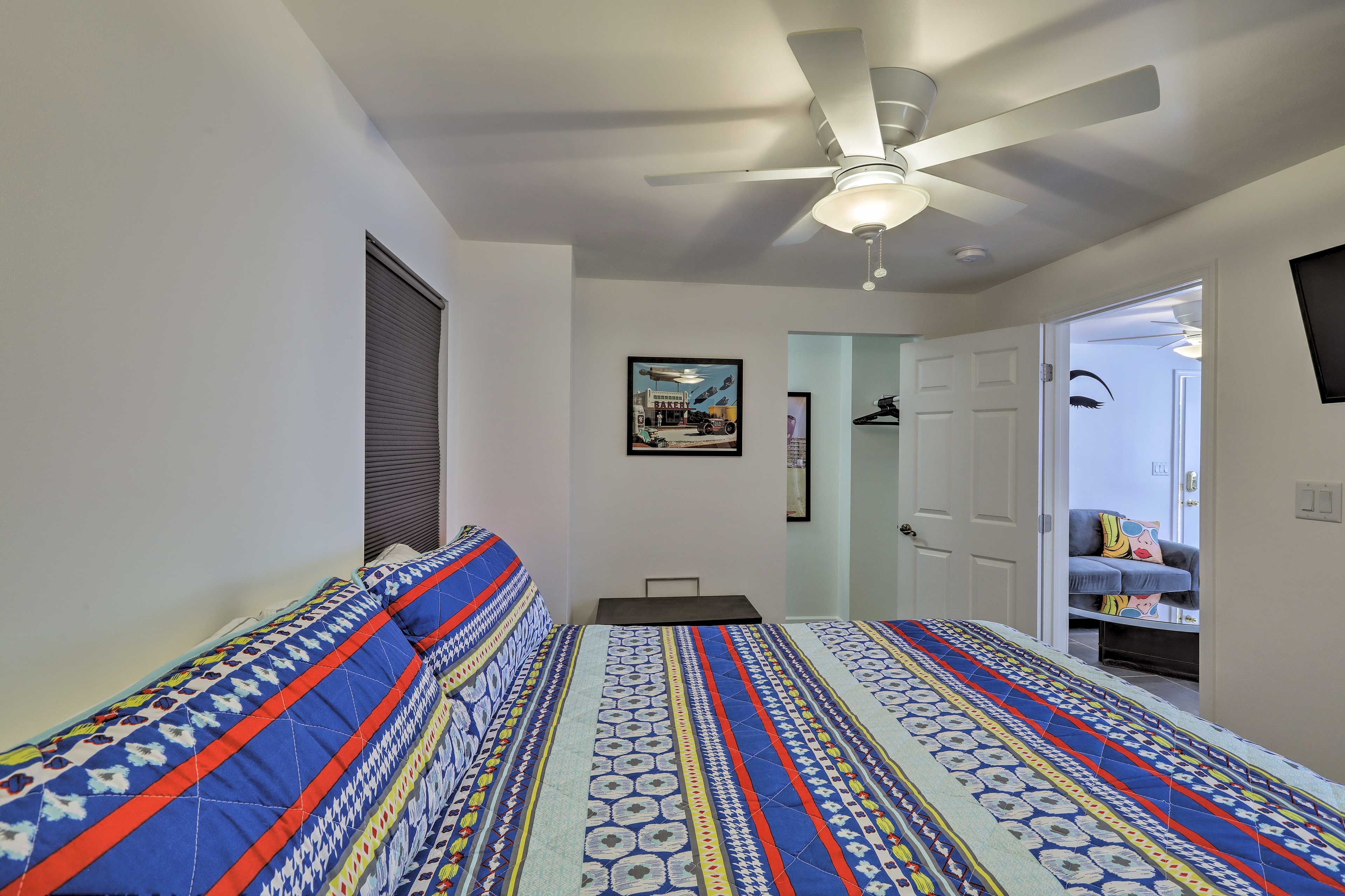 You'll love the colorful decor of this spacious bedroom!