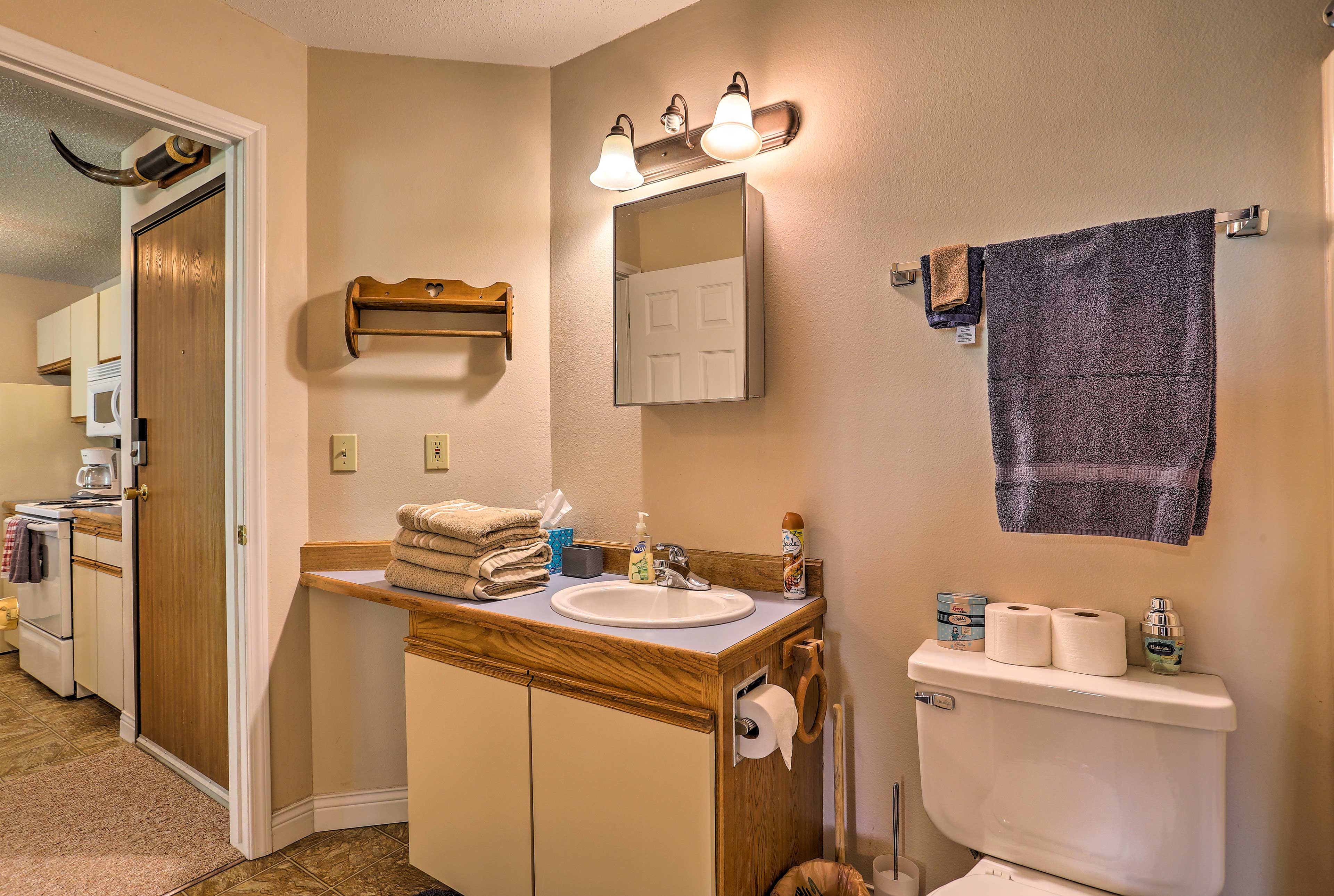 Rinse off the day in this spacious bathroom.