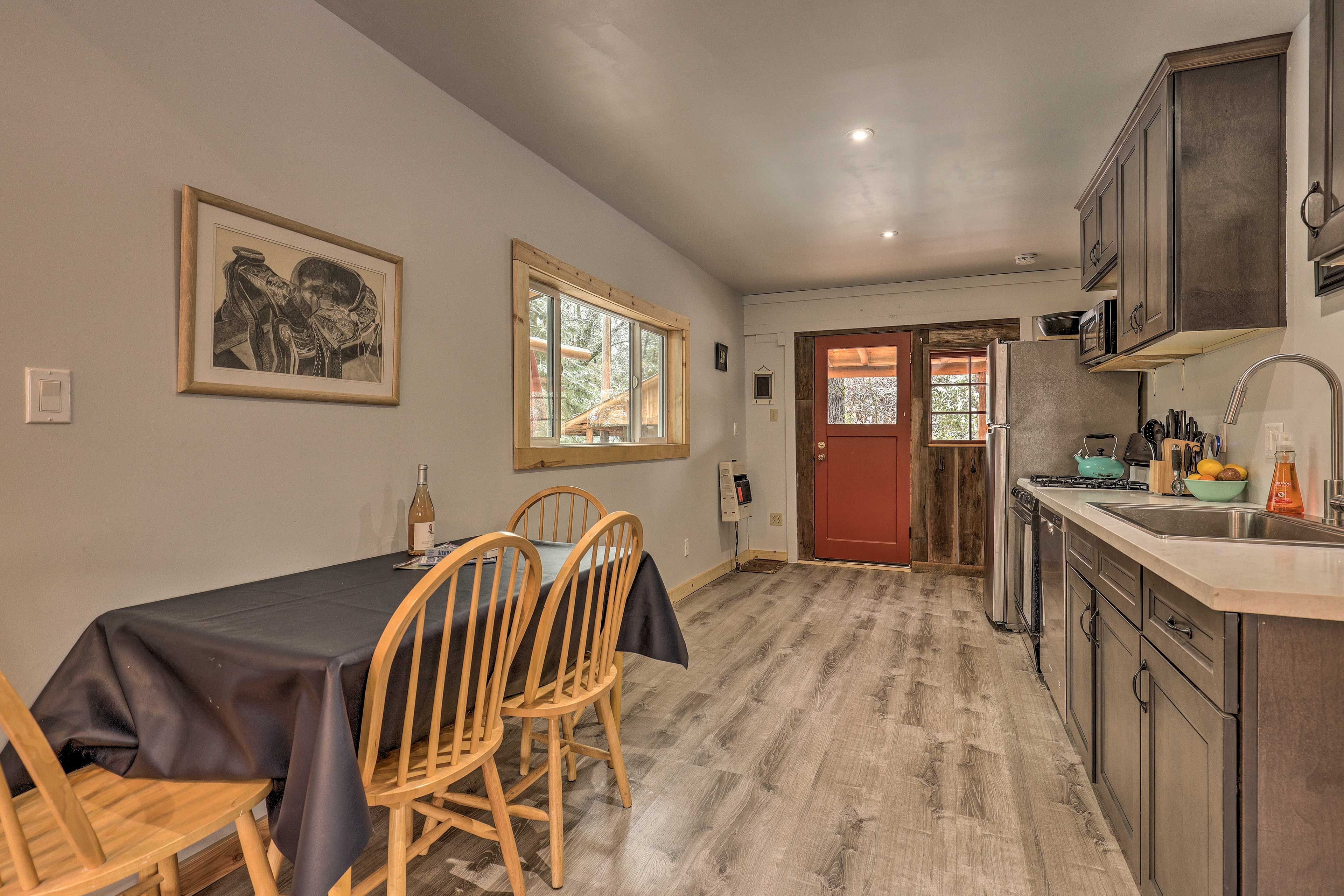 Kitchen & Dining Area | Equipped w/ Cooking Basics