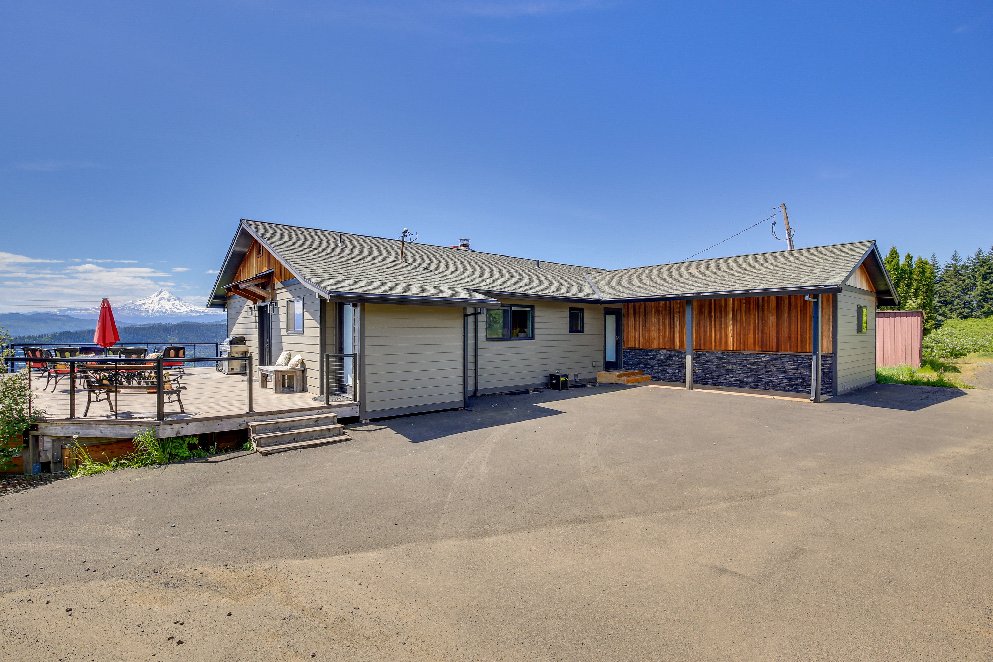 Exterior | Ample Driveway Parking | Carport (1 Vehicle)