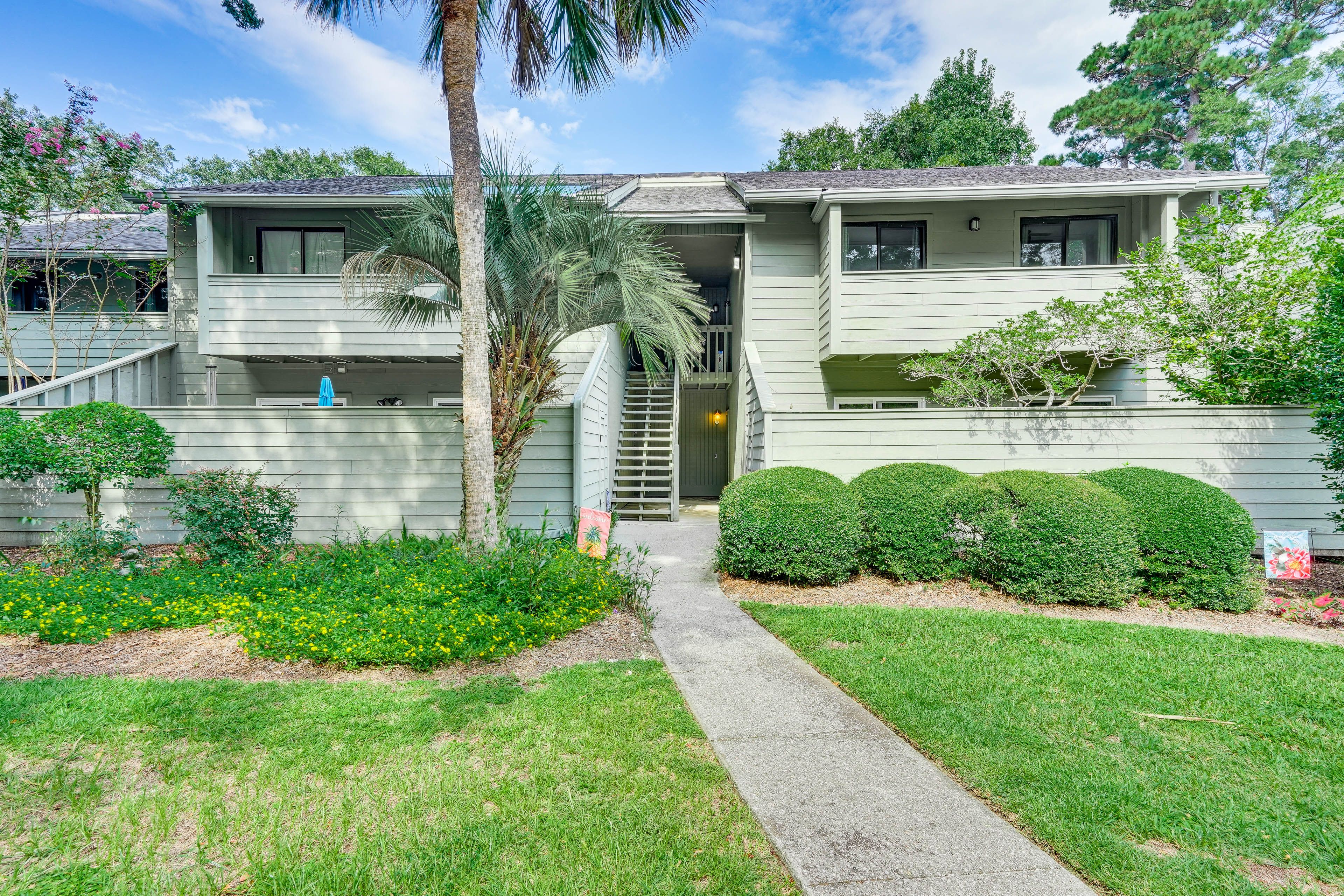 Building Exterior | Upper-Level Unit