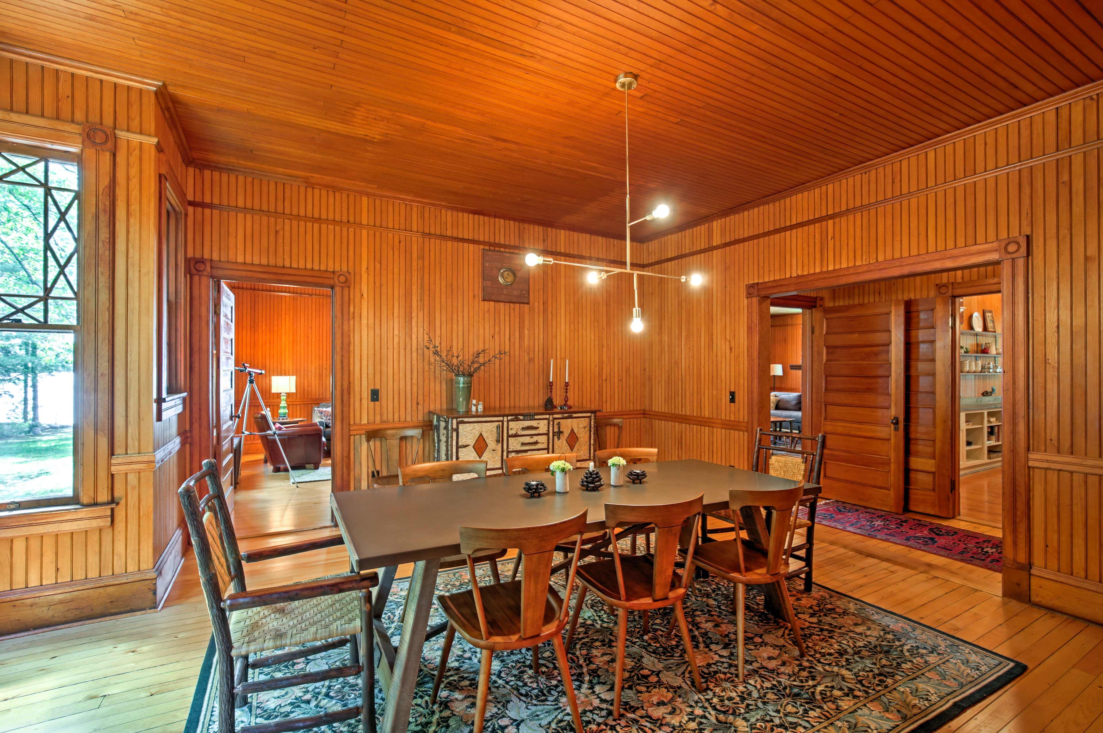 Gather the group for a family dinner around the elegant dining room table.