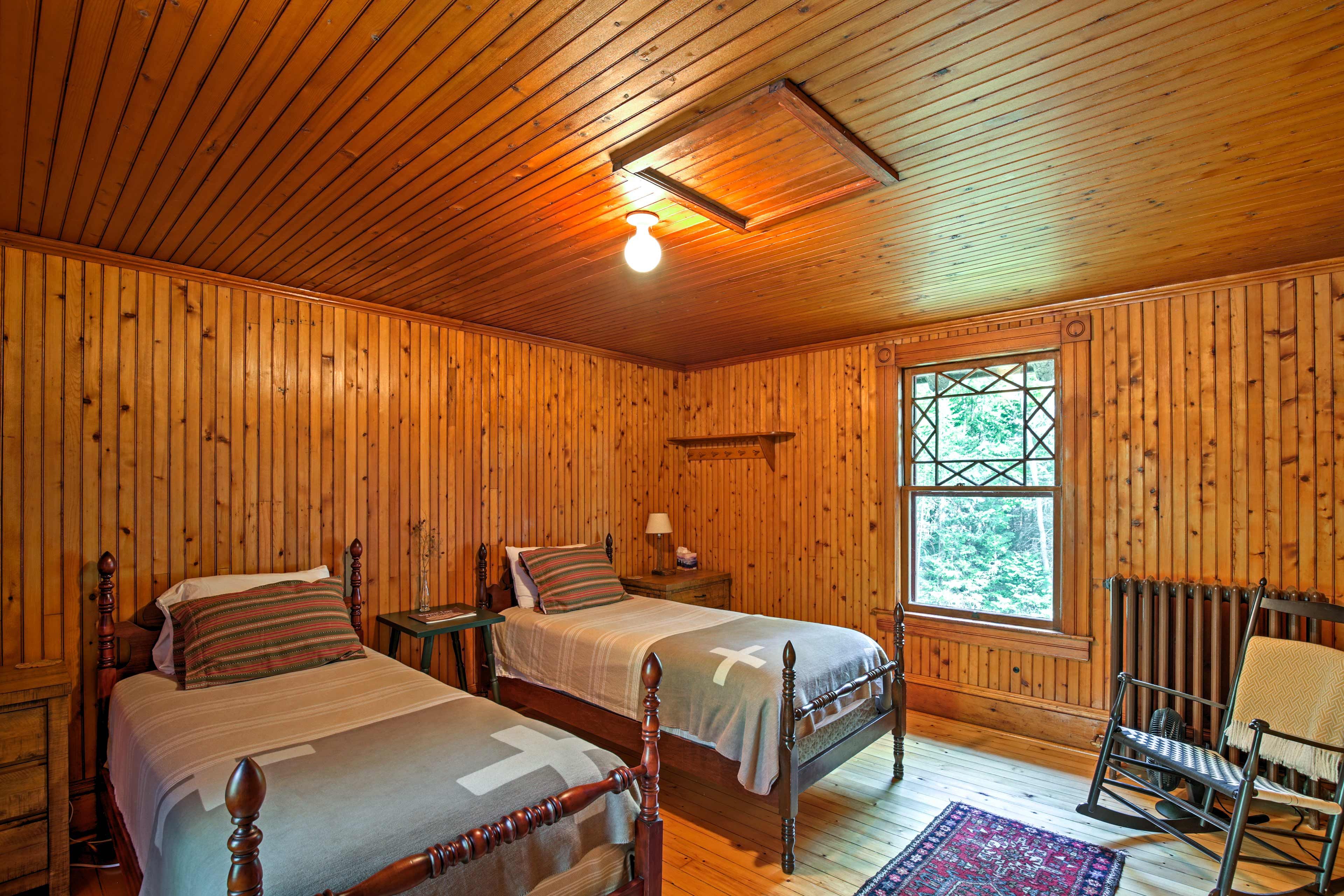The next room boasts 2 twin beds.