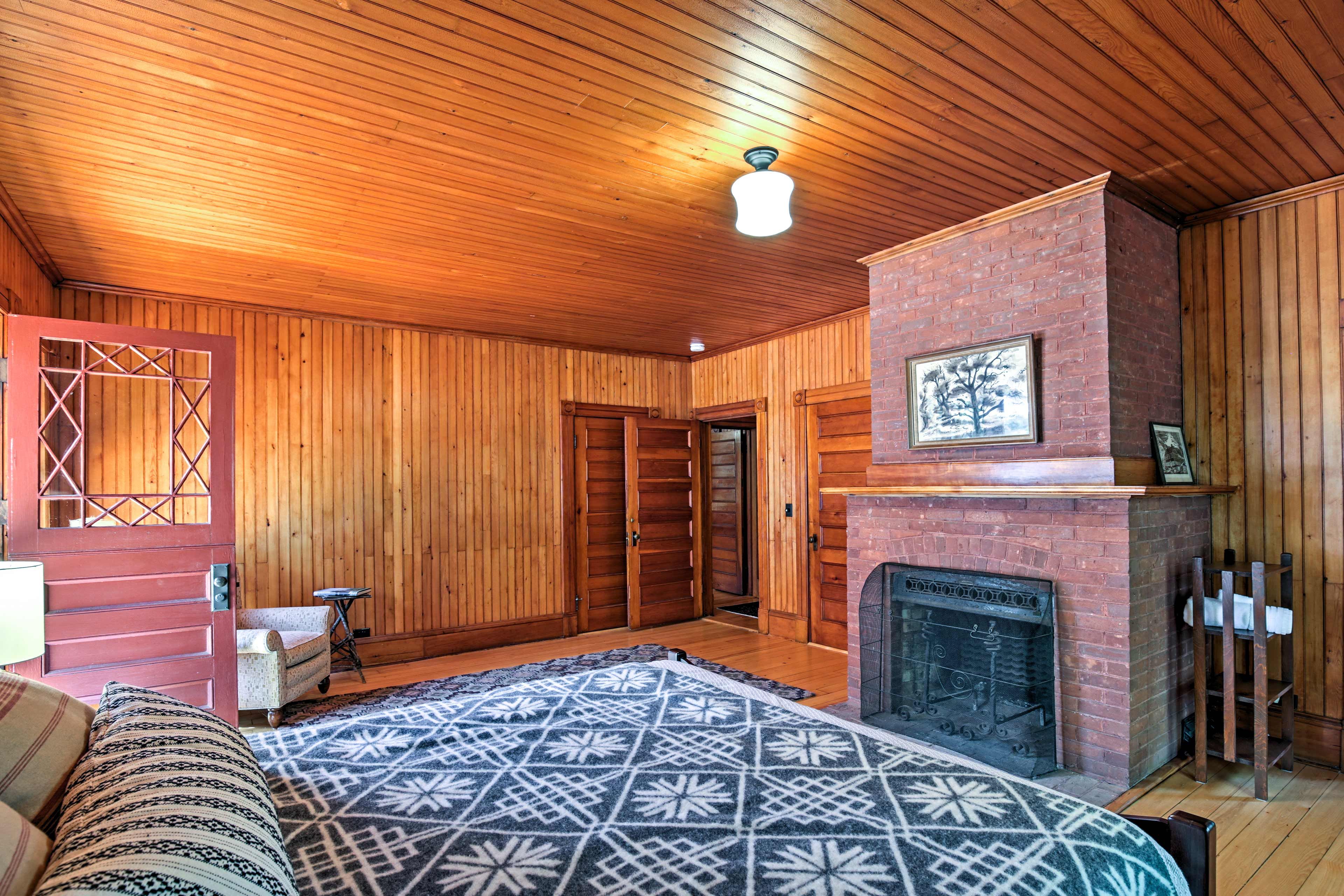 This home features 4 wood-burning fireplaces in total.