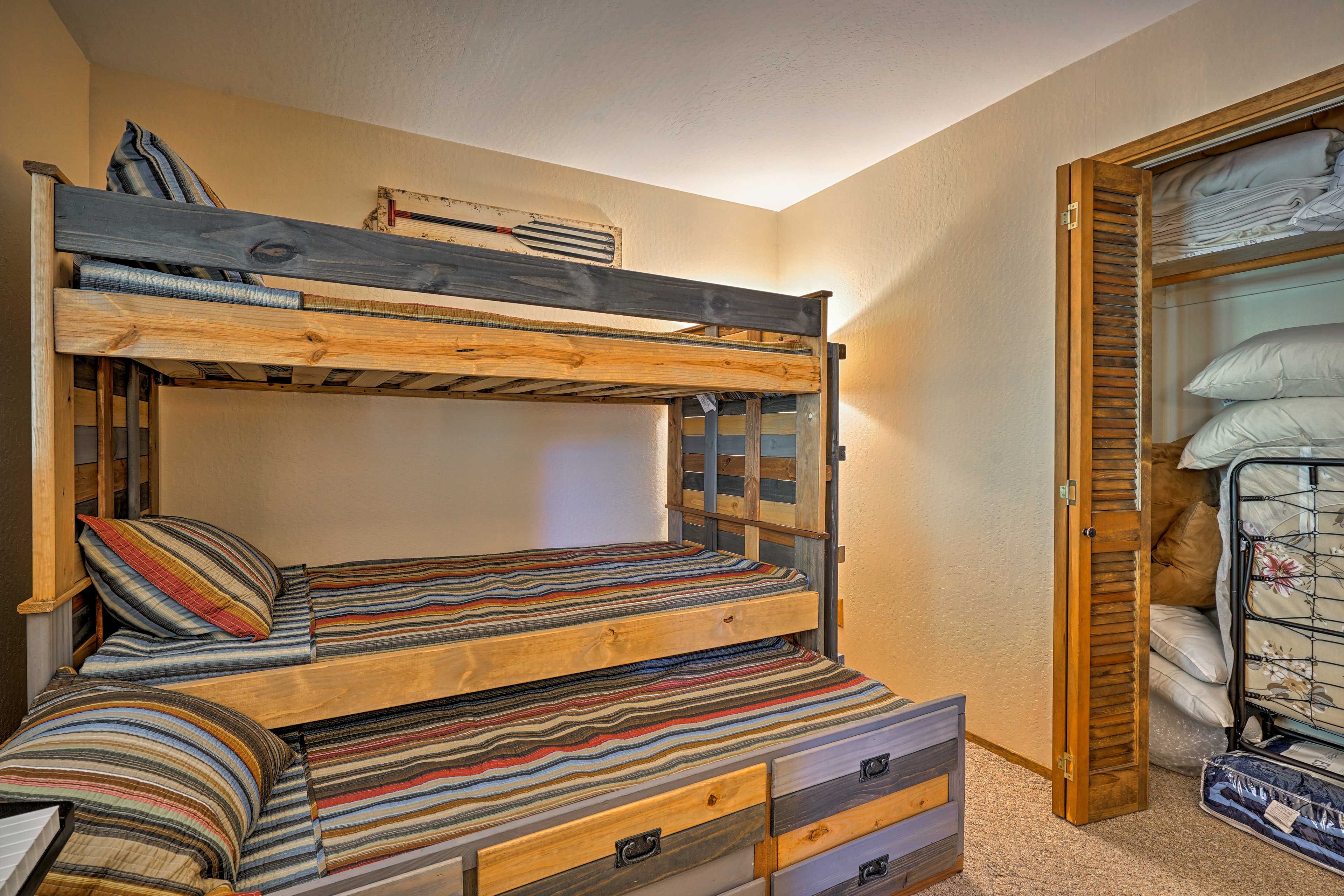 This room features a twin-over-twin bunk bed with a twin trundle.