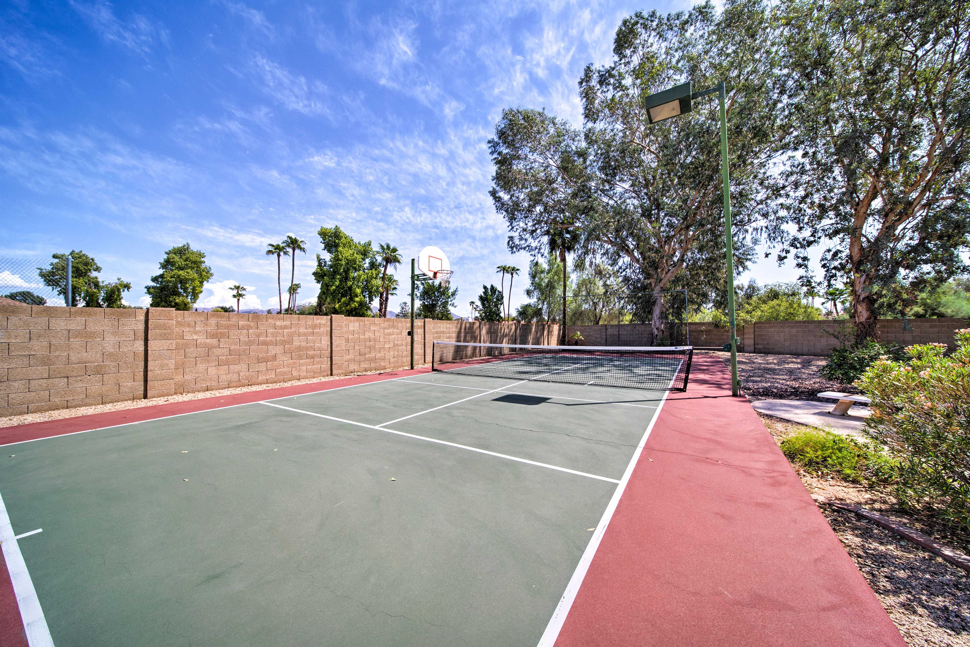 You're sure to love the fenced-in backyard with grapefruit and orange trees!