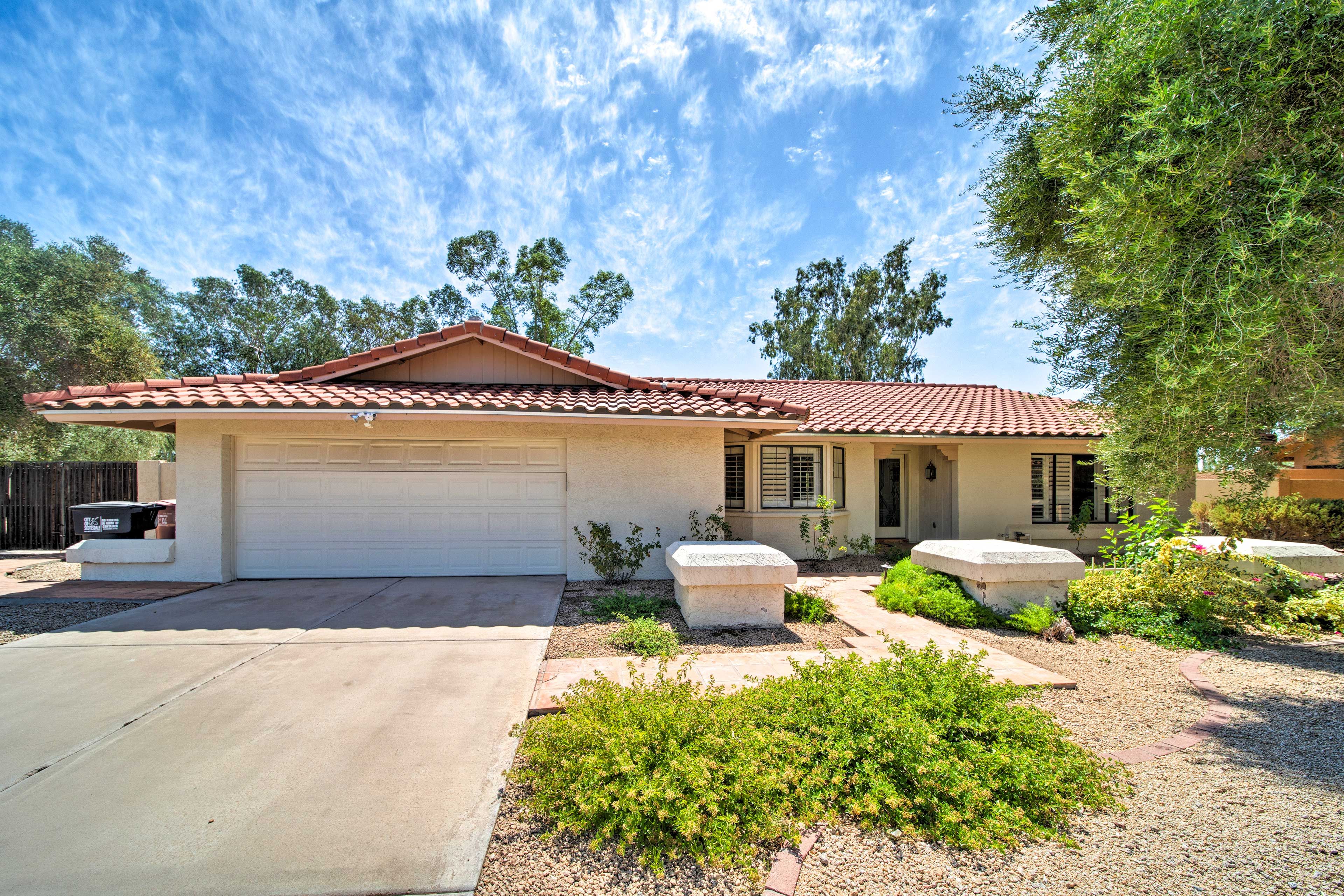 The home offers parking for 4 vehicles in the garage and driveway.