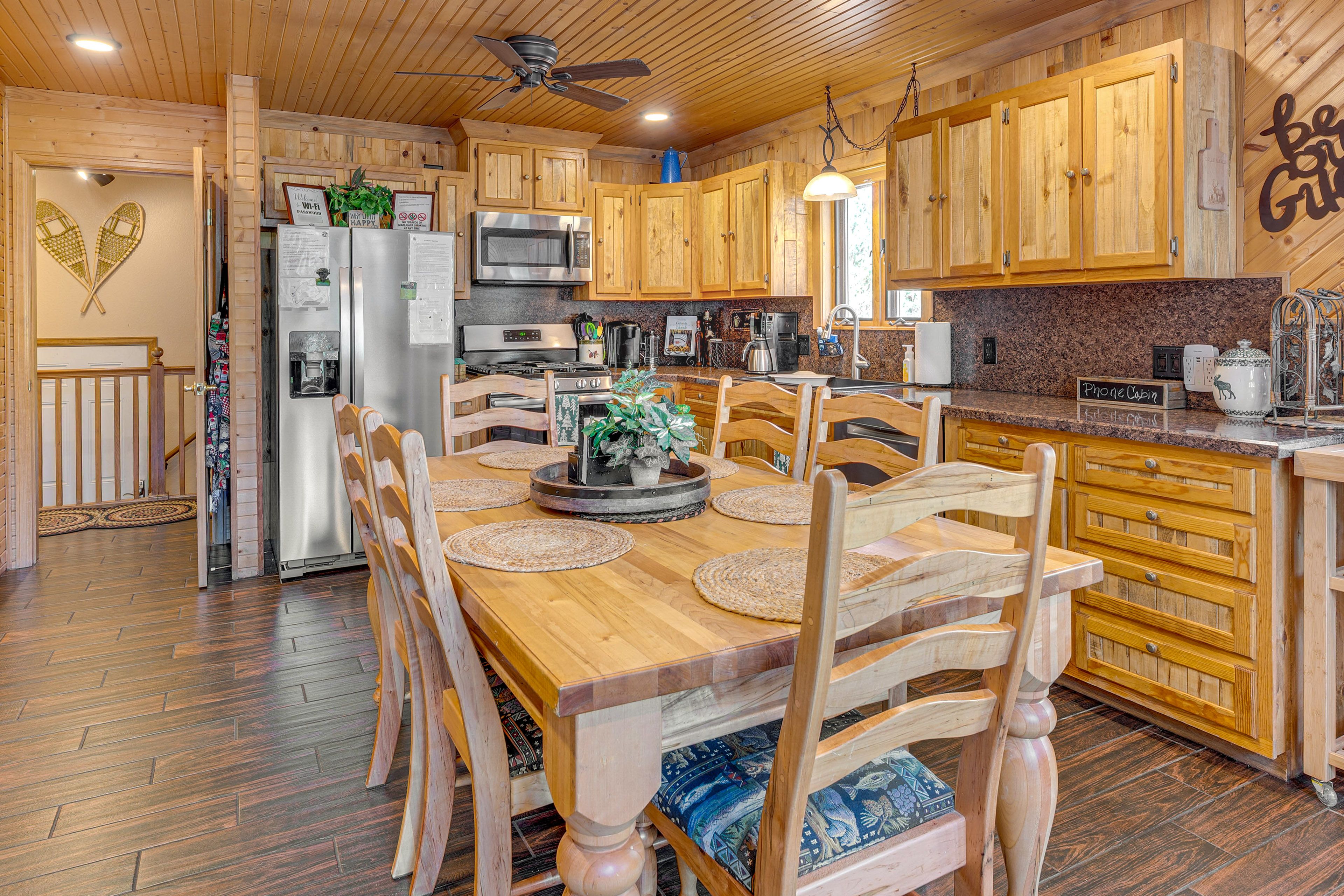 Kitchen & Dining Area | 1st Floor | Dishes & Flatware Provided | Open Floor Plan