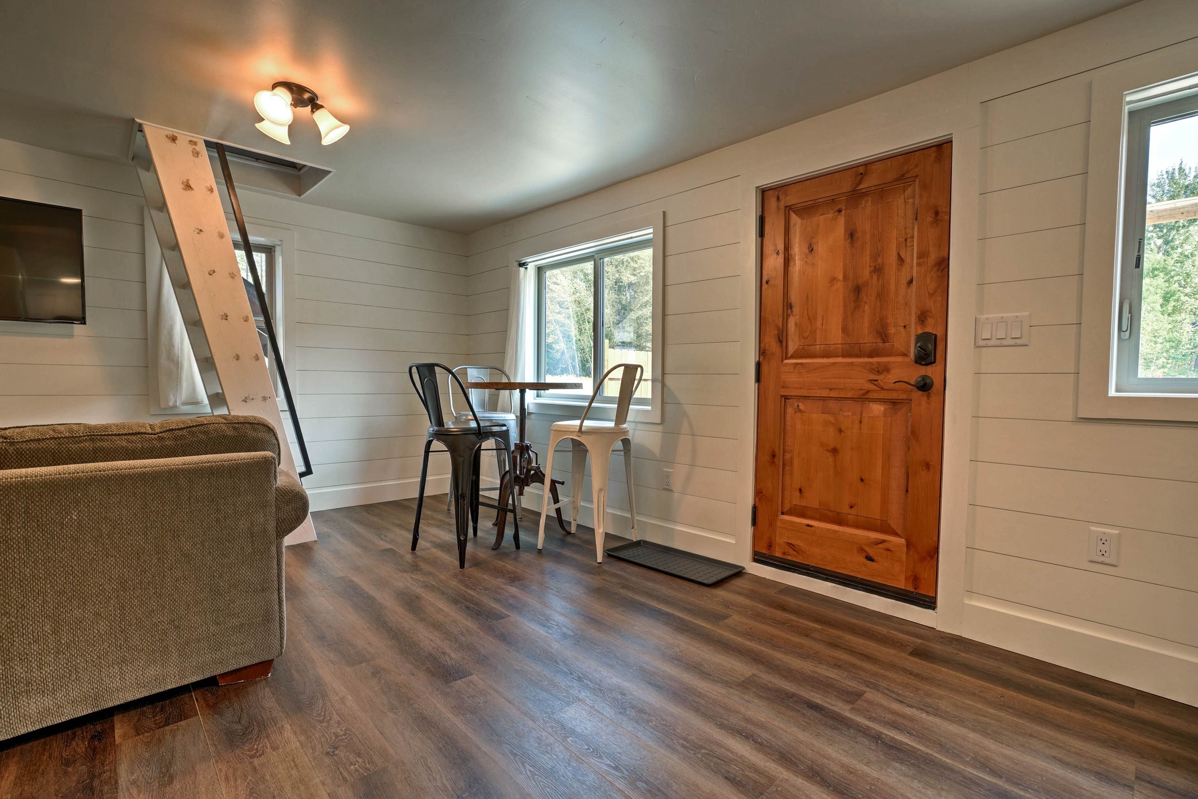 Natural light streams into the chic living space.