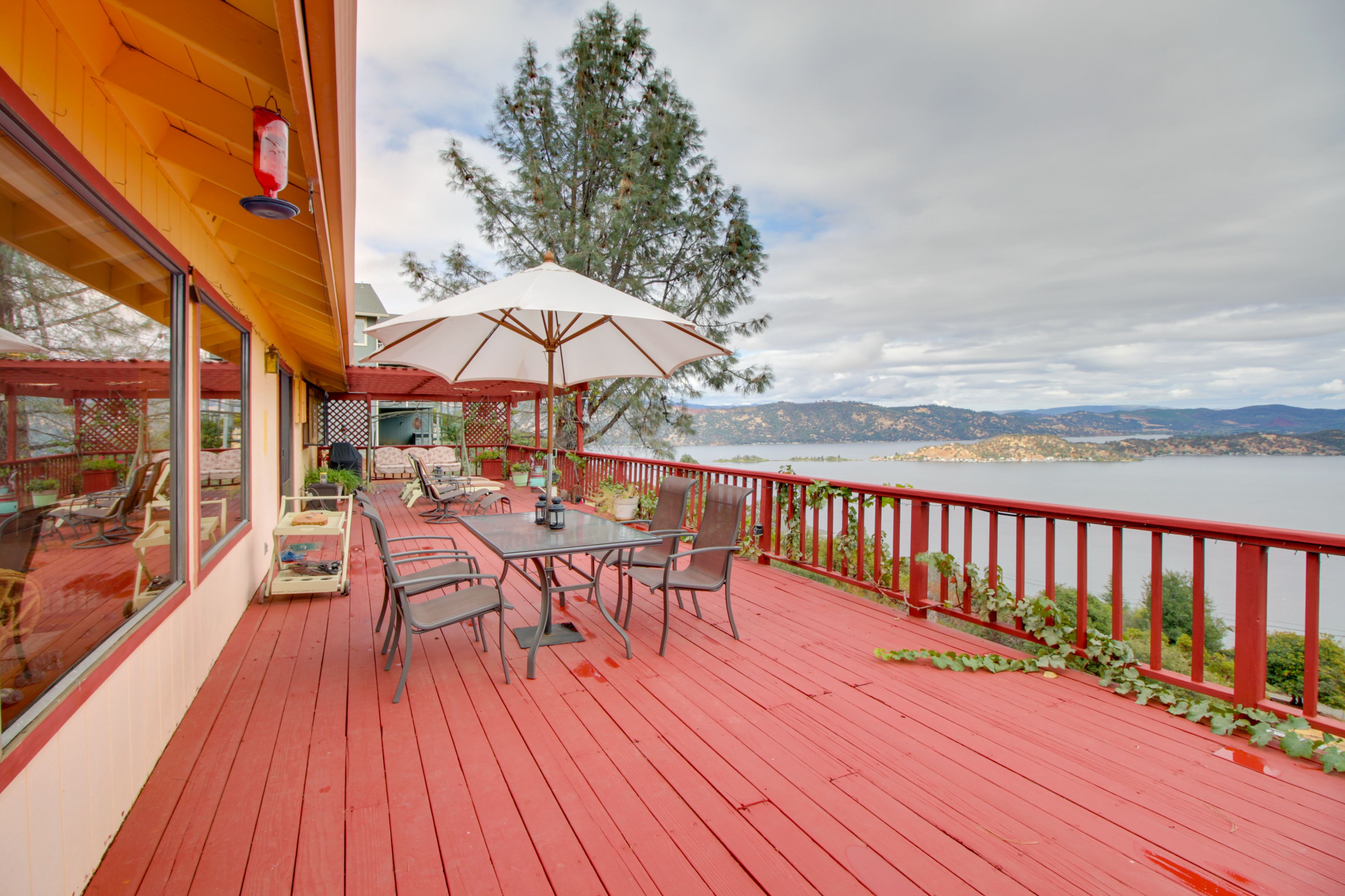 Spacious Deck | Lake & Mountain Views | Outdoor Dining | Loungers | Gas Grill